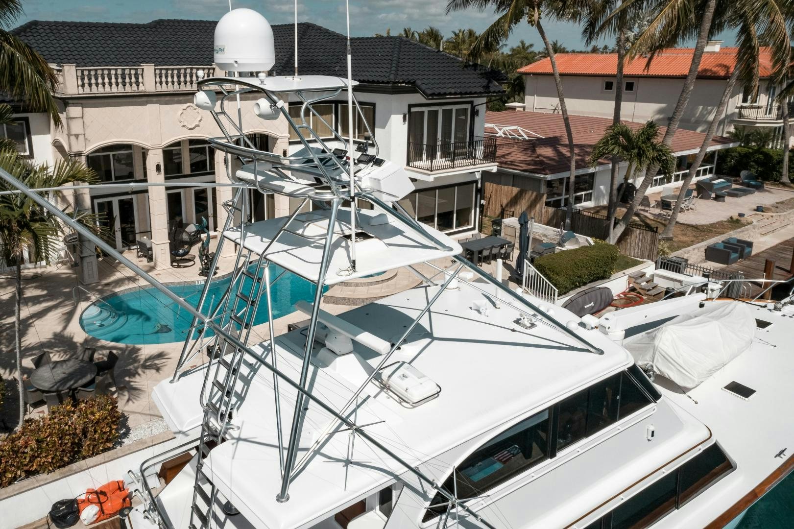 a boat with a blue tarp on it aboard CAPITAN MORGAN  Yacht for Sale