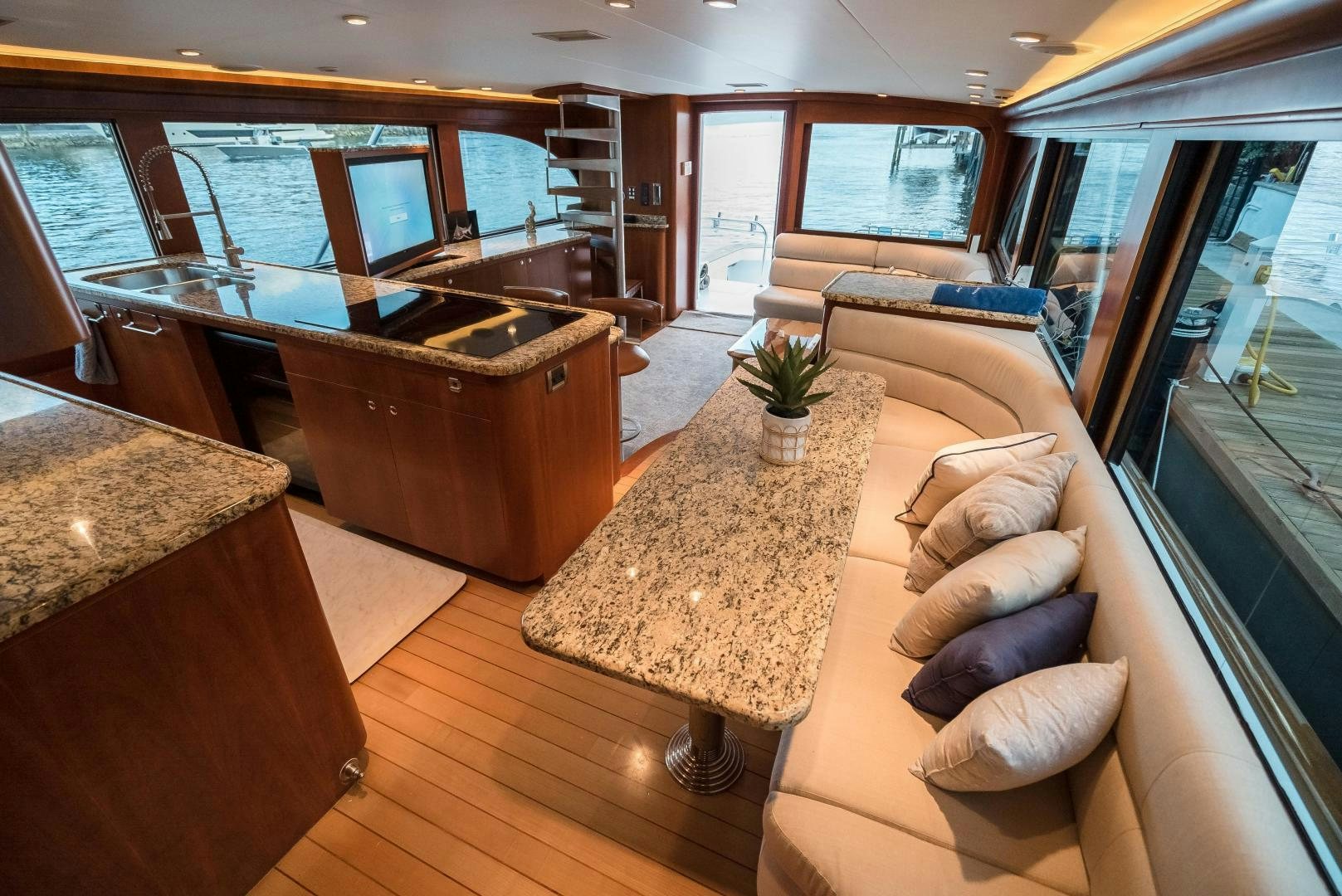 a living room with a large window aboard CAPITAN MORGAN  Yacht for Sale