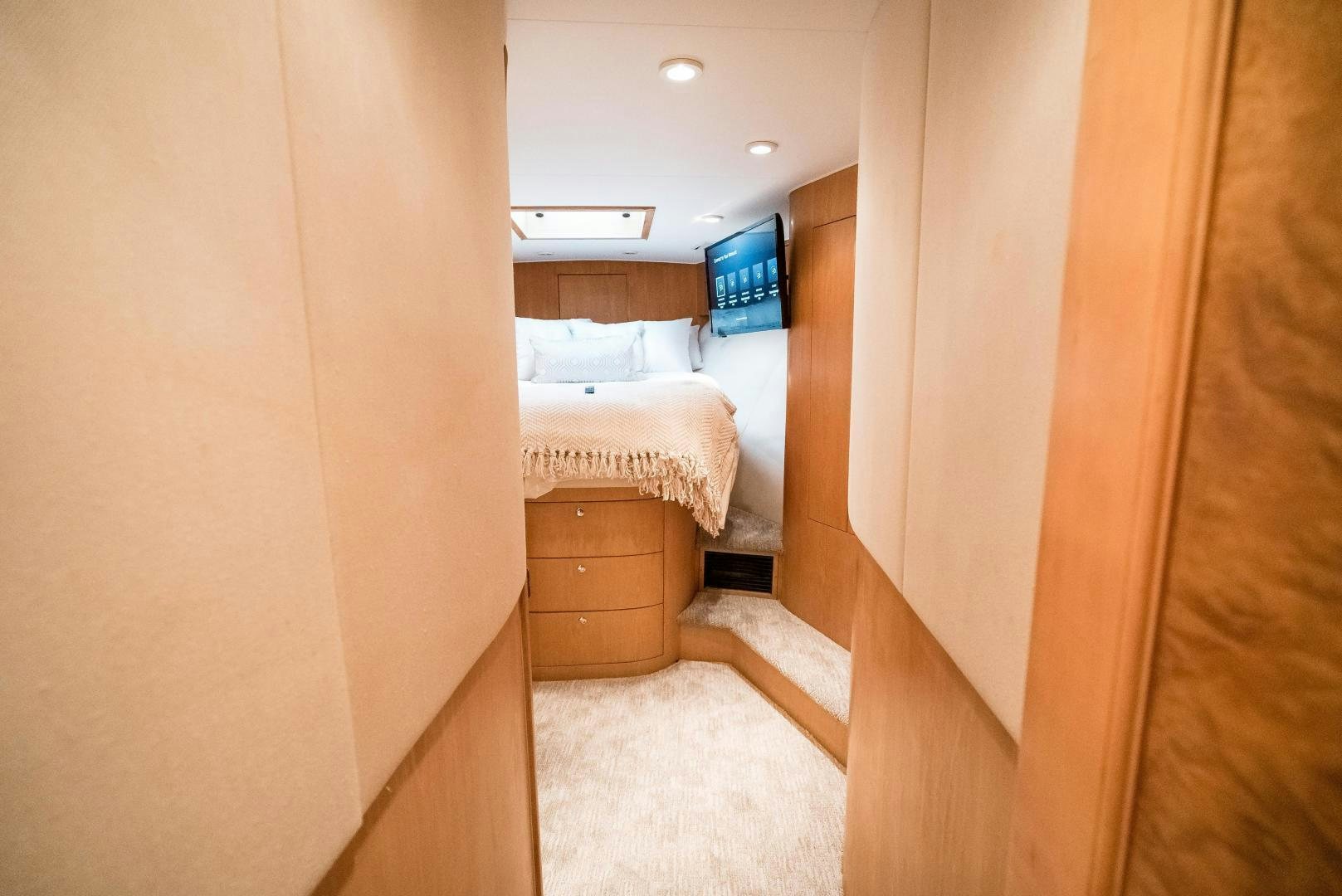 a room with a bed and a window aboard CAPITAN MORGAN  Yacht for Sale