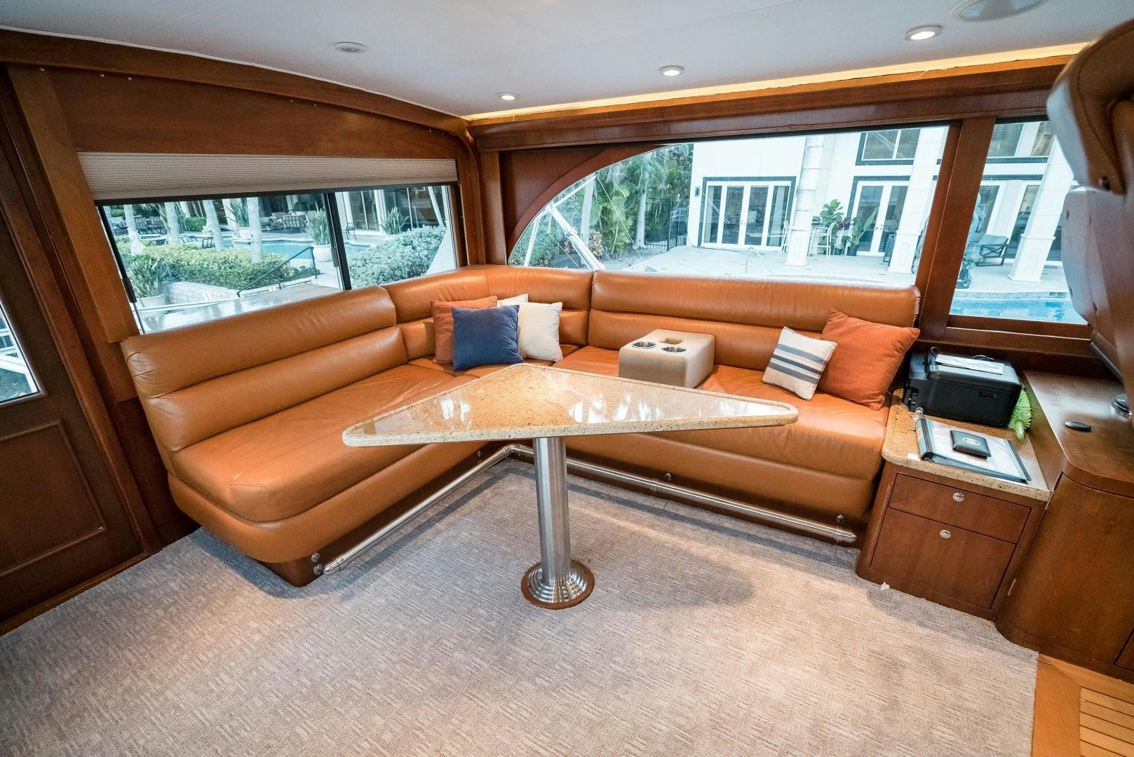 a living room with a couch and a coffee table aboard CAPITAN MORGAN  Yacht for Sale