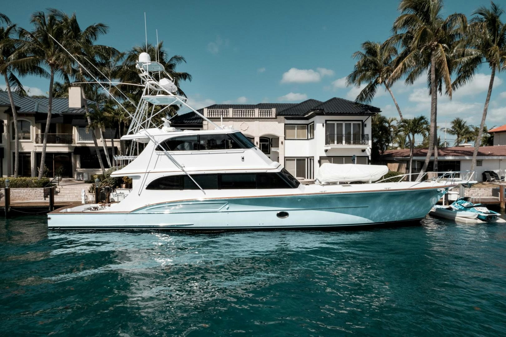 a white boat in a body of water aboard CAPITAN MORGAN  Yacht for Sale