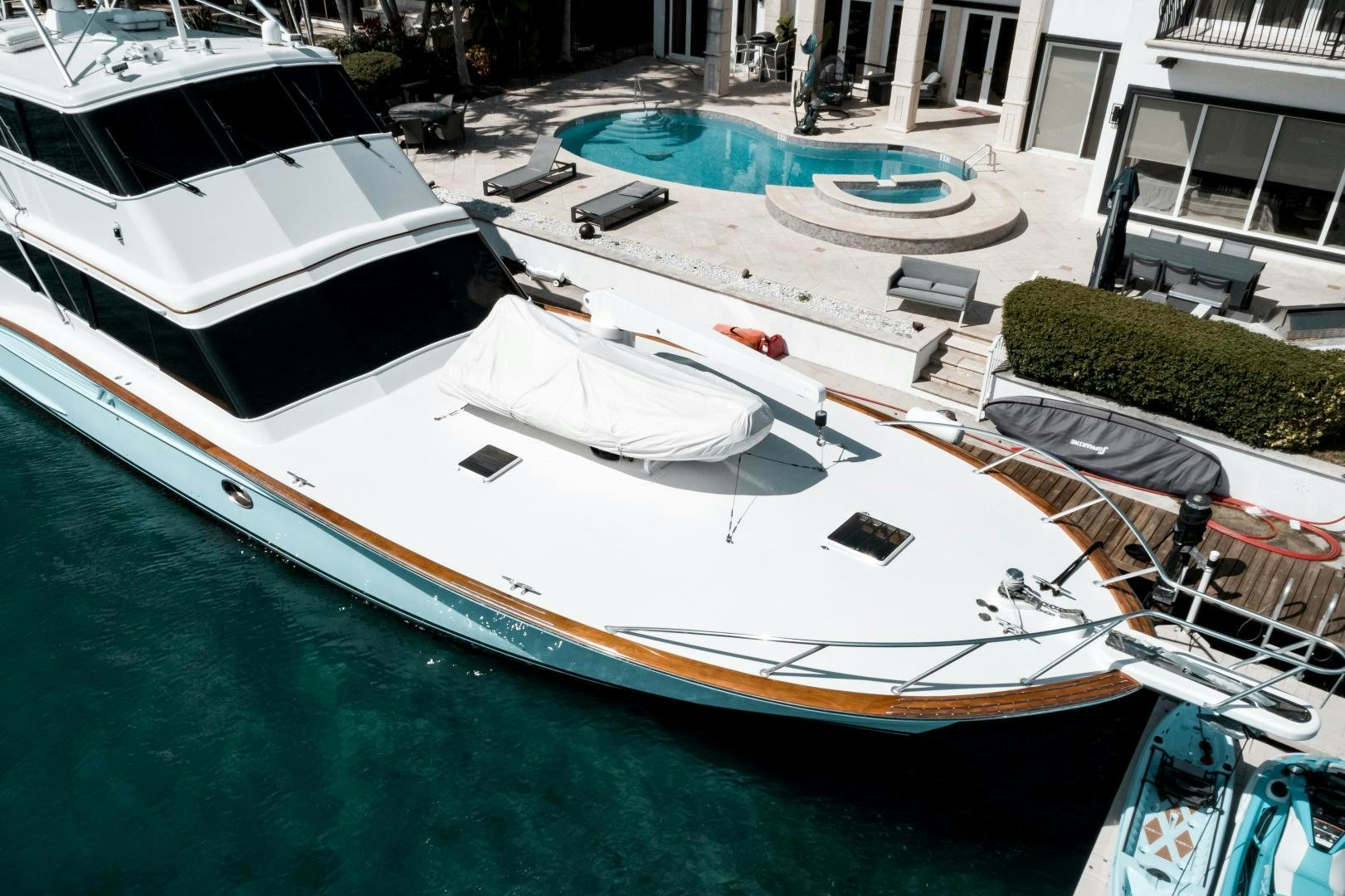 a large white boat in a harbor aboard CAPITAN MORGAN  Yacht for Sale