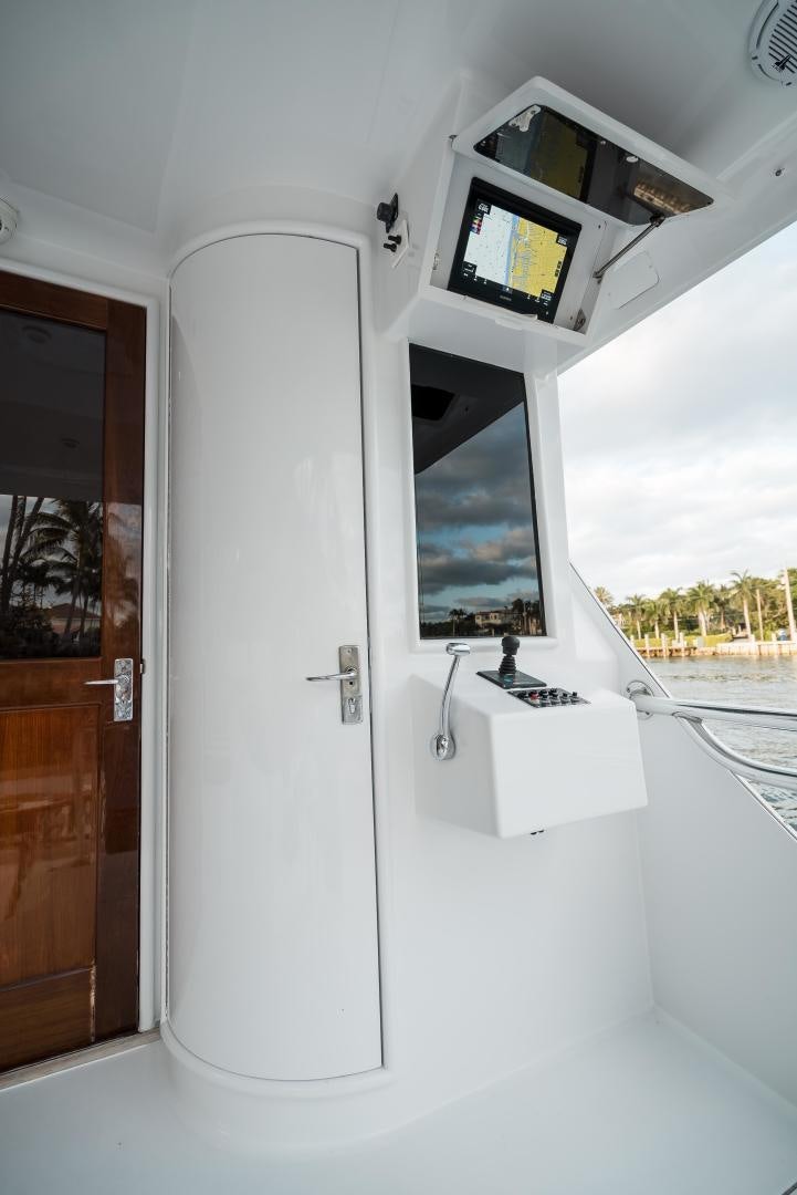 a white machine with a screen aboard CAPITAN MORGAN  Yacht for Sale