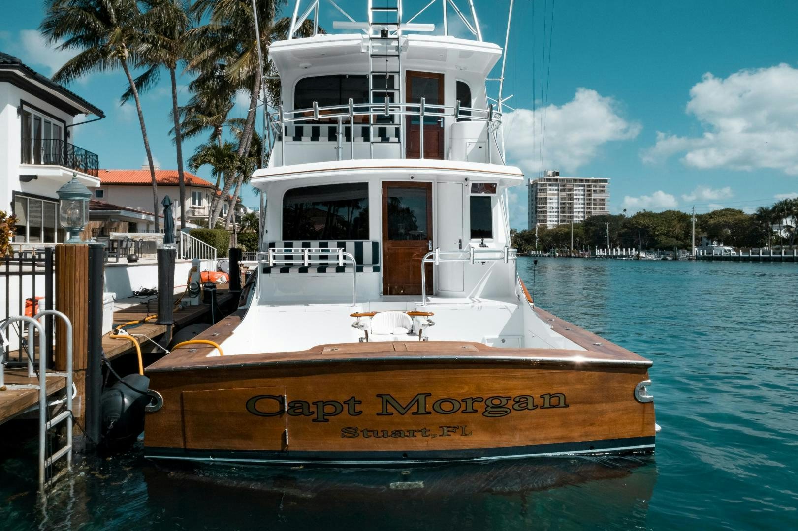 a boat docked at a pier aboard CAPITAN MORGAN  Yacht for Sale
