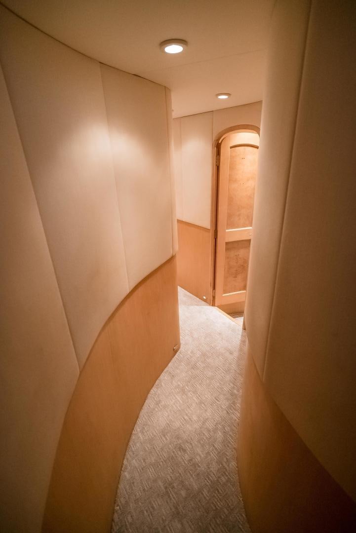 a hallway with a white towel aboard CAPITAN MORGAN  Yacht for Sale