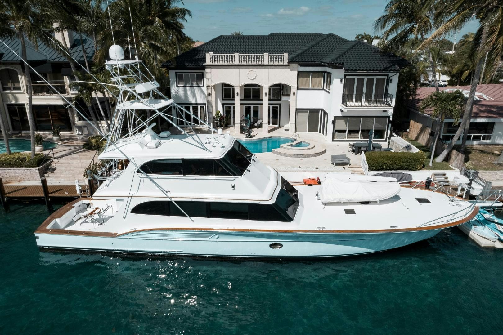 a boat docked at a pier aboard CAPITAN MORGAN  Yacht for Sale