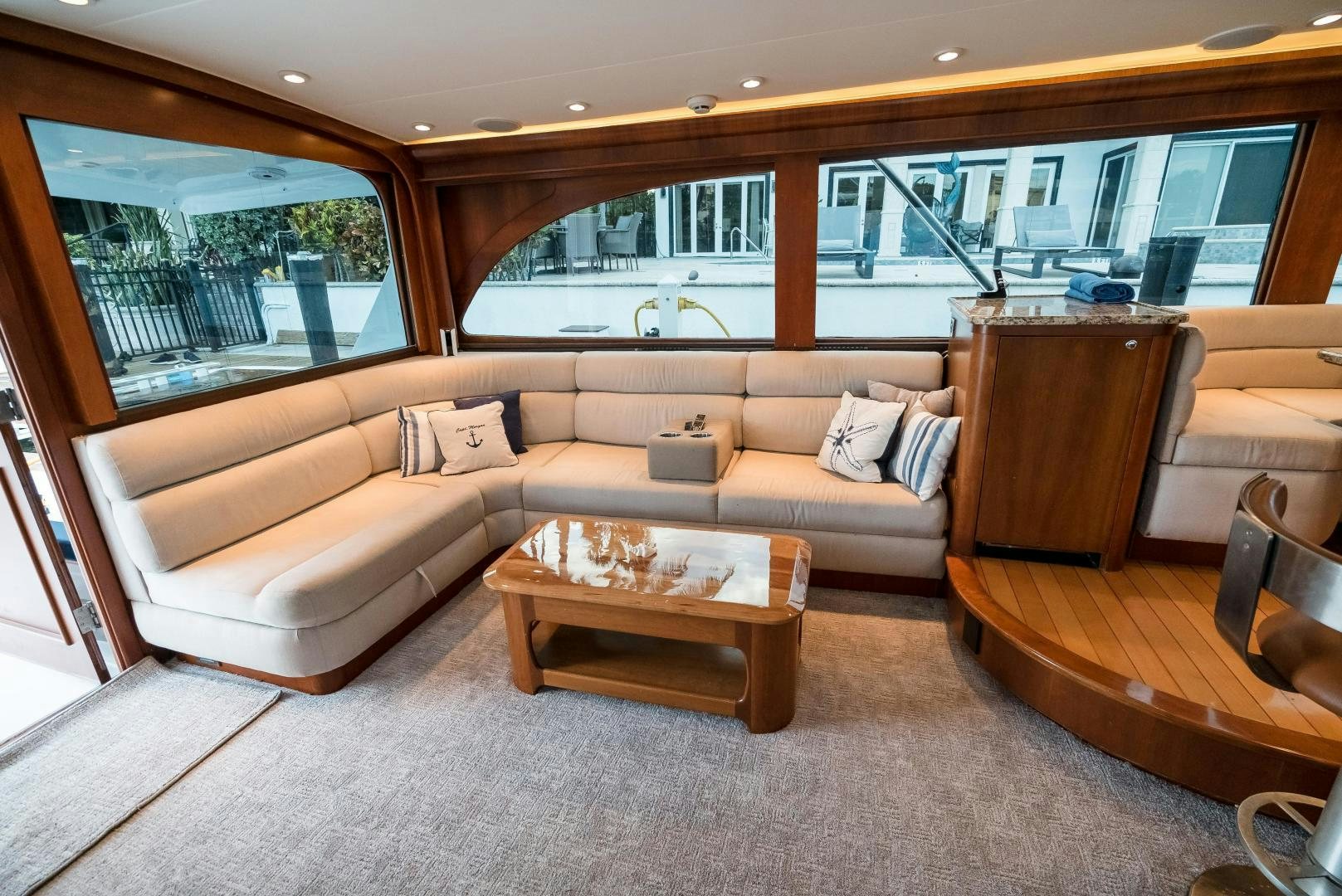 a living room with a couch and a coffee table aboard CAPITAN MORGAN  Yacht for Sale
