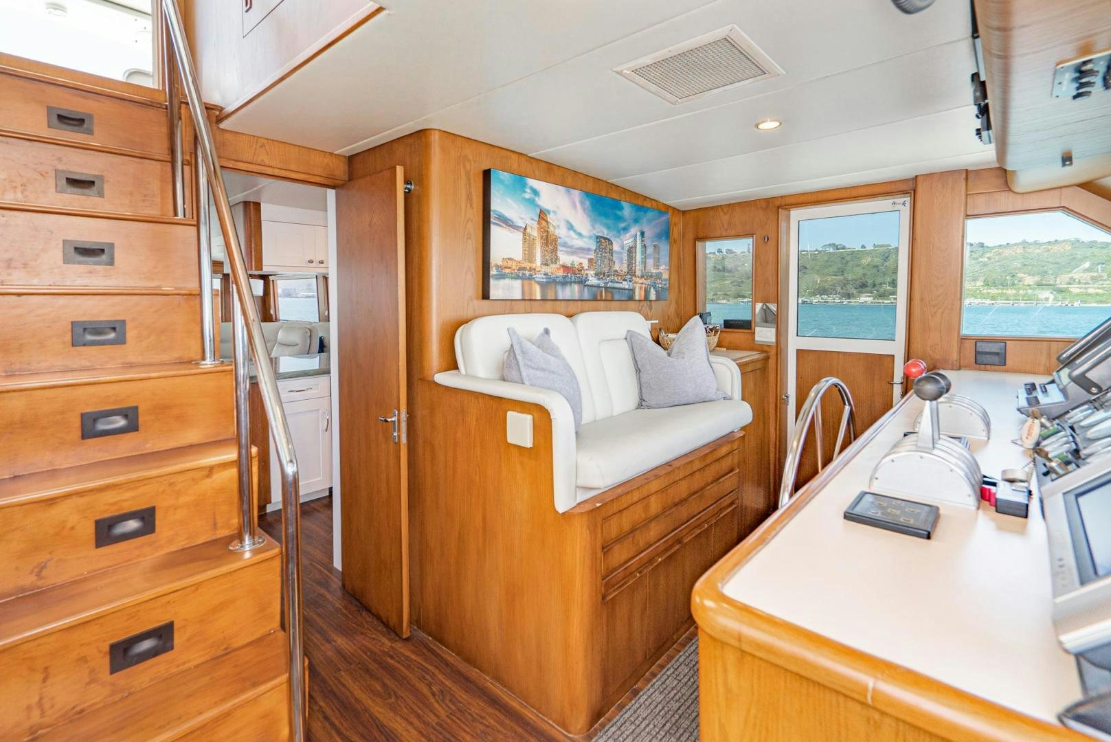 a room with a bed and a desk aboard IMAGINE Yacht for Sale