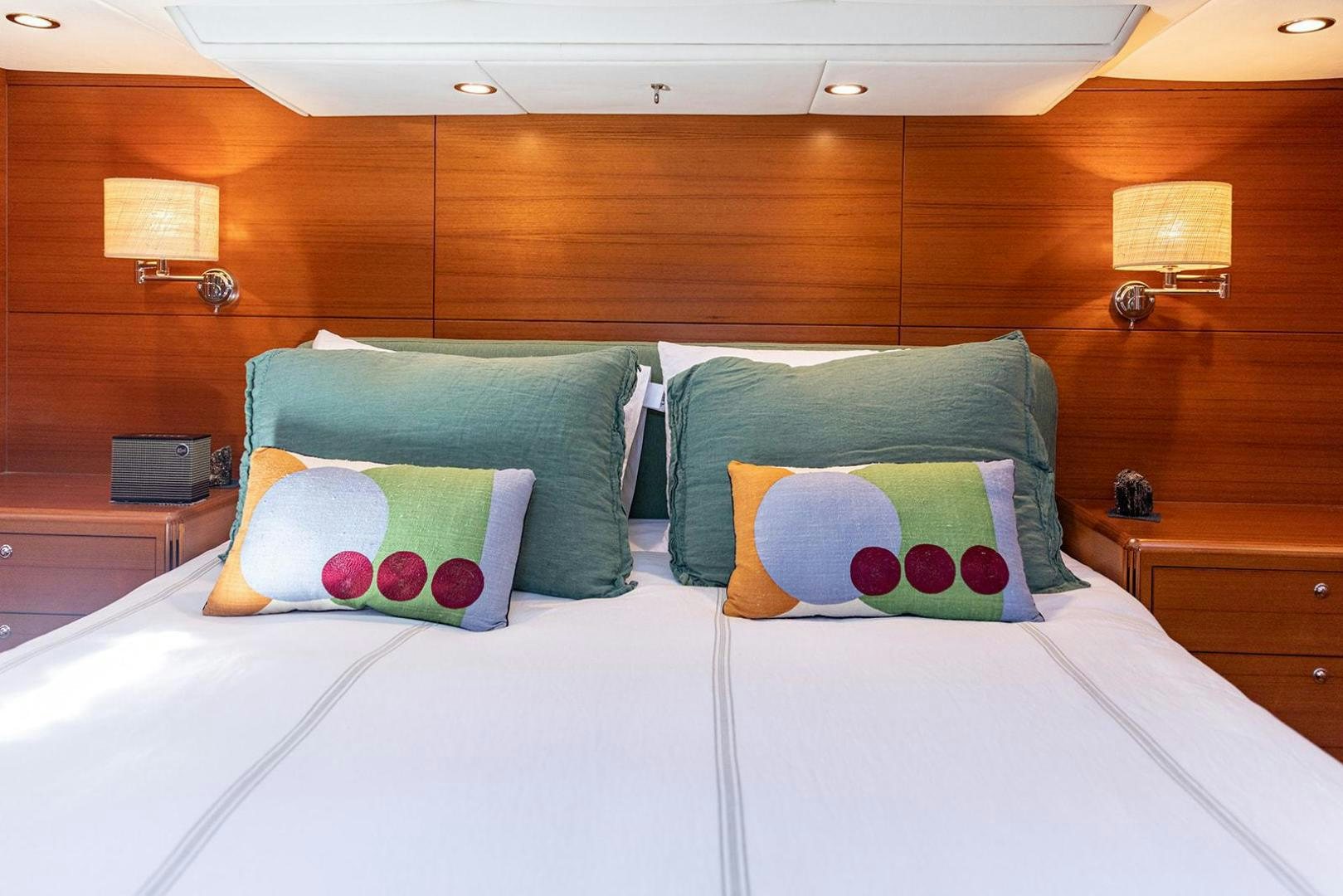a bed with pillows and pillows aboard FRIDA Yacht for Sale
