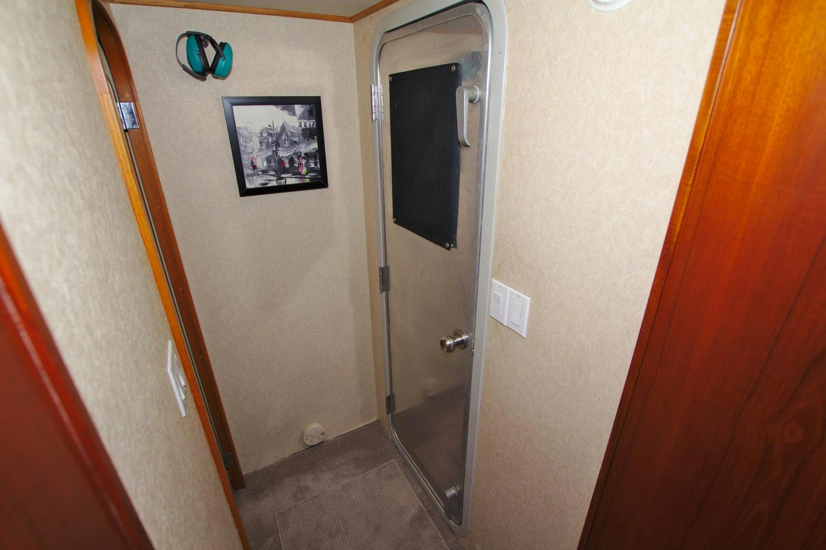 a door with a mirror aboard PENDANA Yacht for Sale