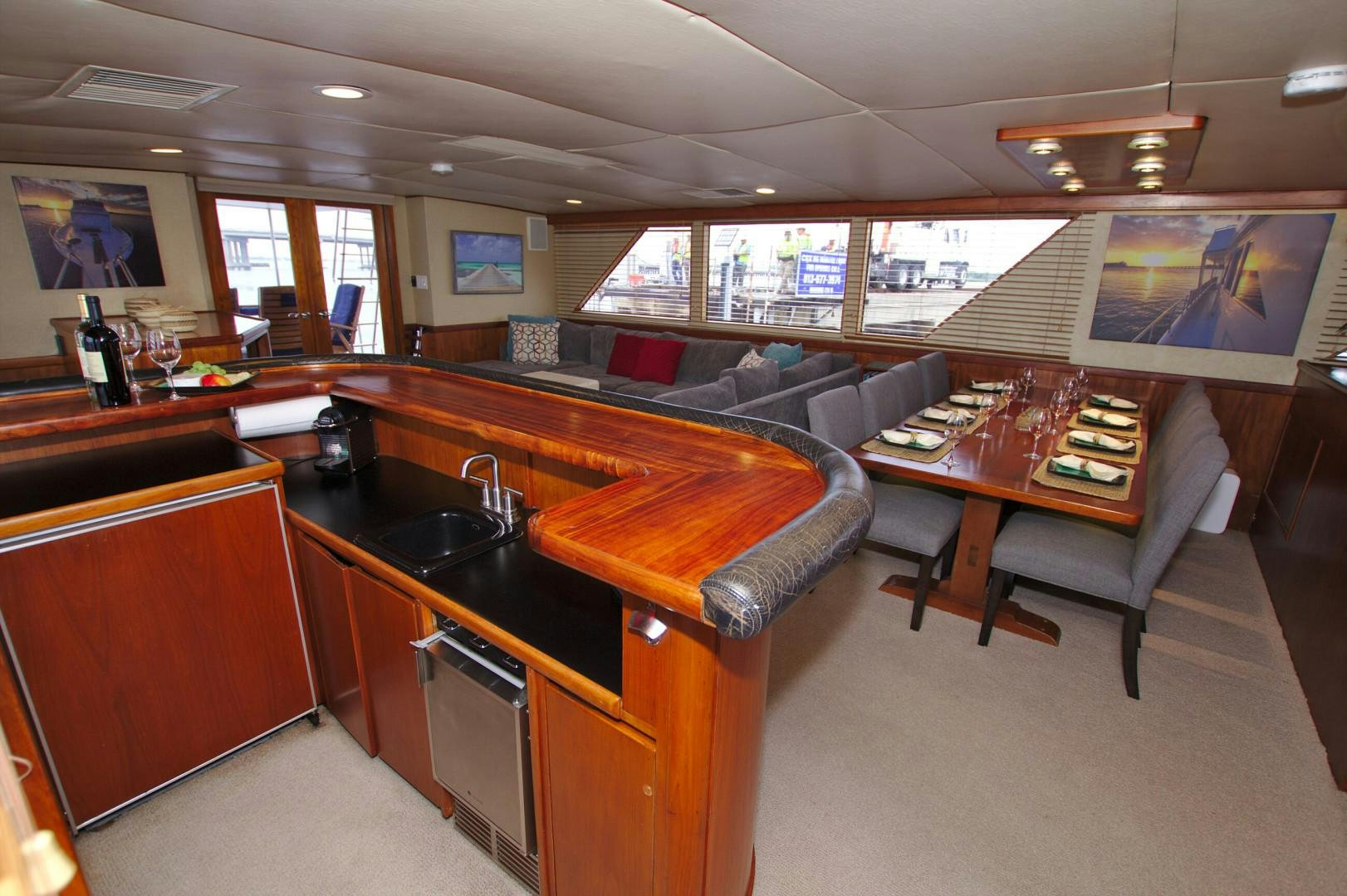 a large kitchen and living room aboard PENDANA Yacht for Sale