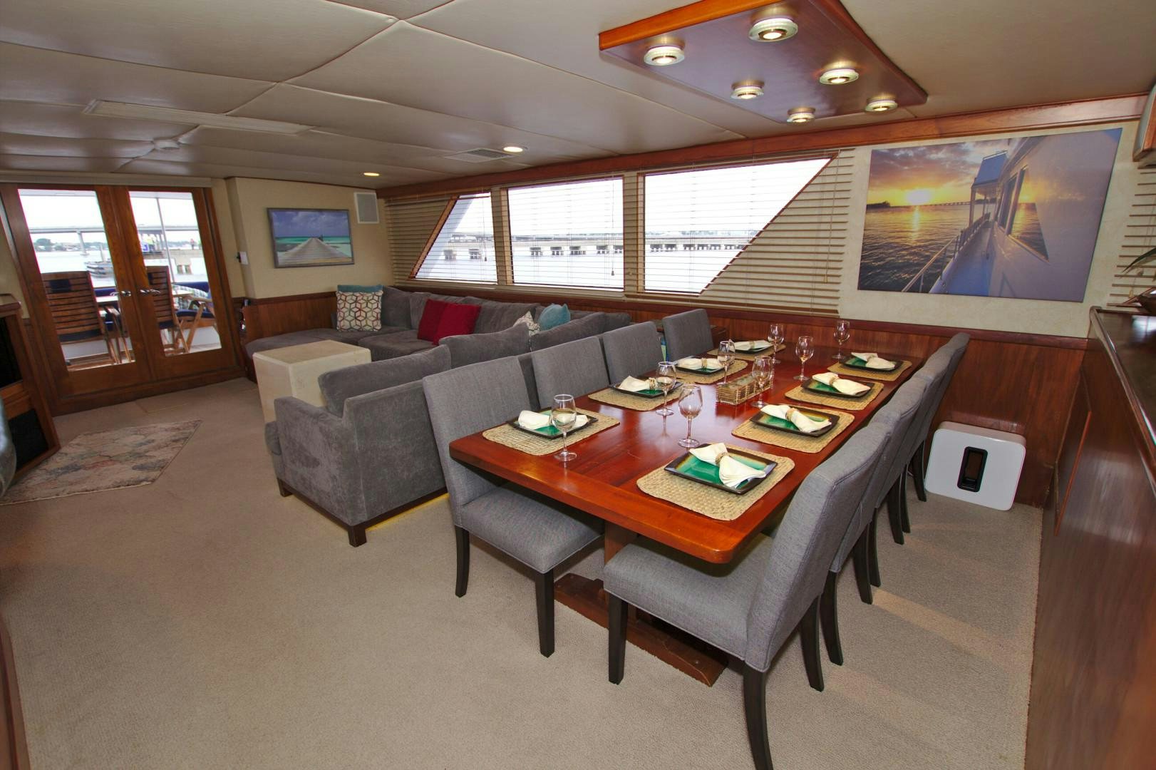 a conference room with a couch and a table aboard PENDANA Yacht for Sale
