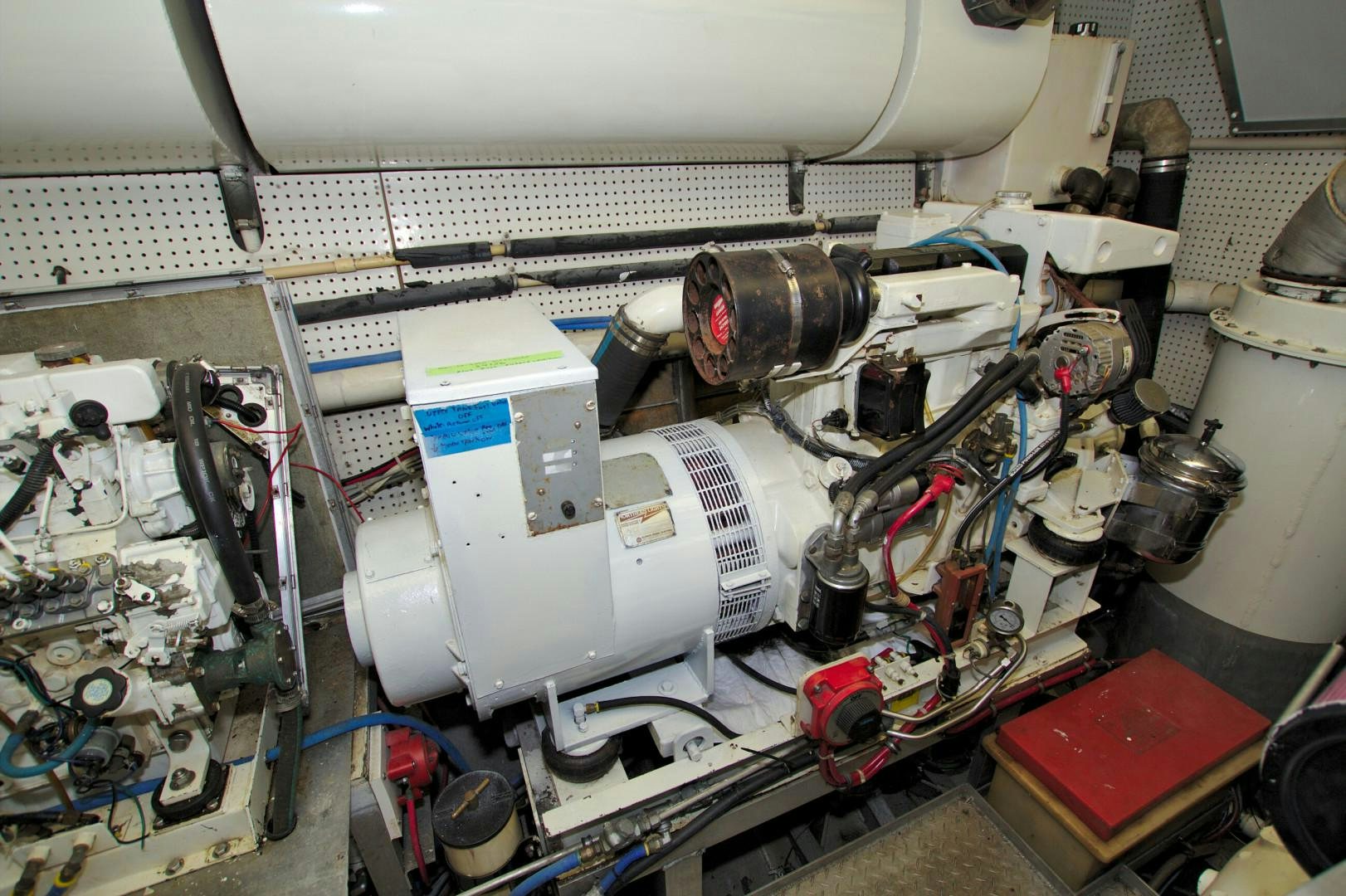 a car engine with a few parts aboard PENDANA Yacht for Sale
