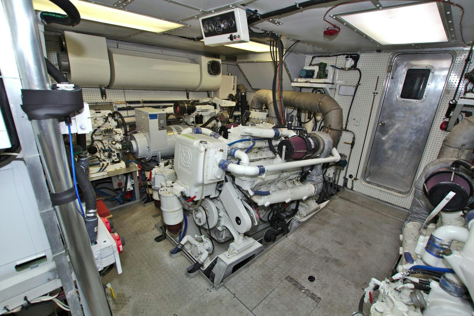 a room with machinery aboard PENDANA Yacht for Sale
