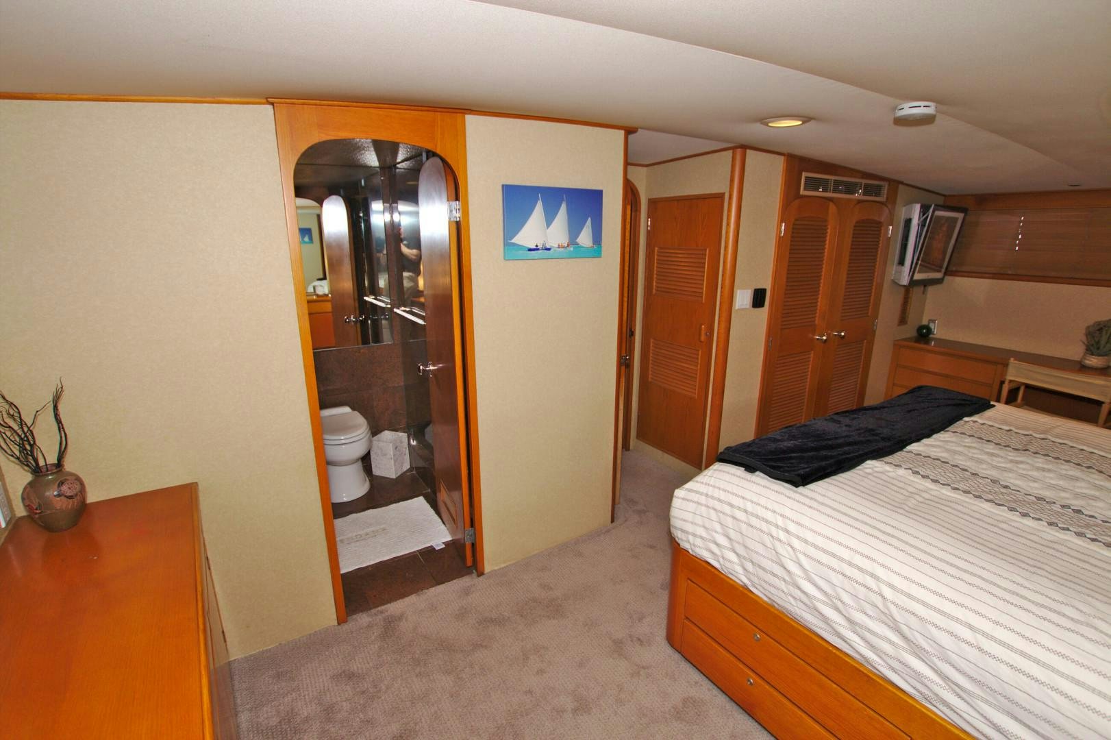 a bathroom with a large mirror aboard PENDANA Yacht for Sale