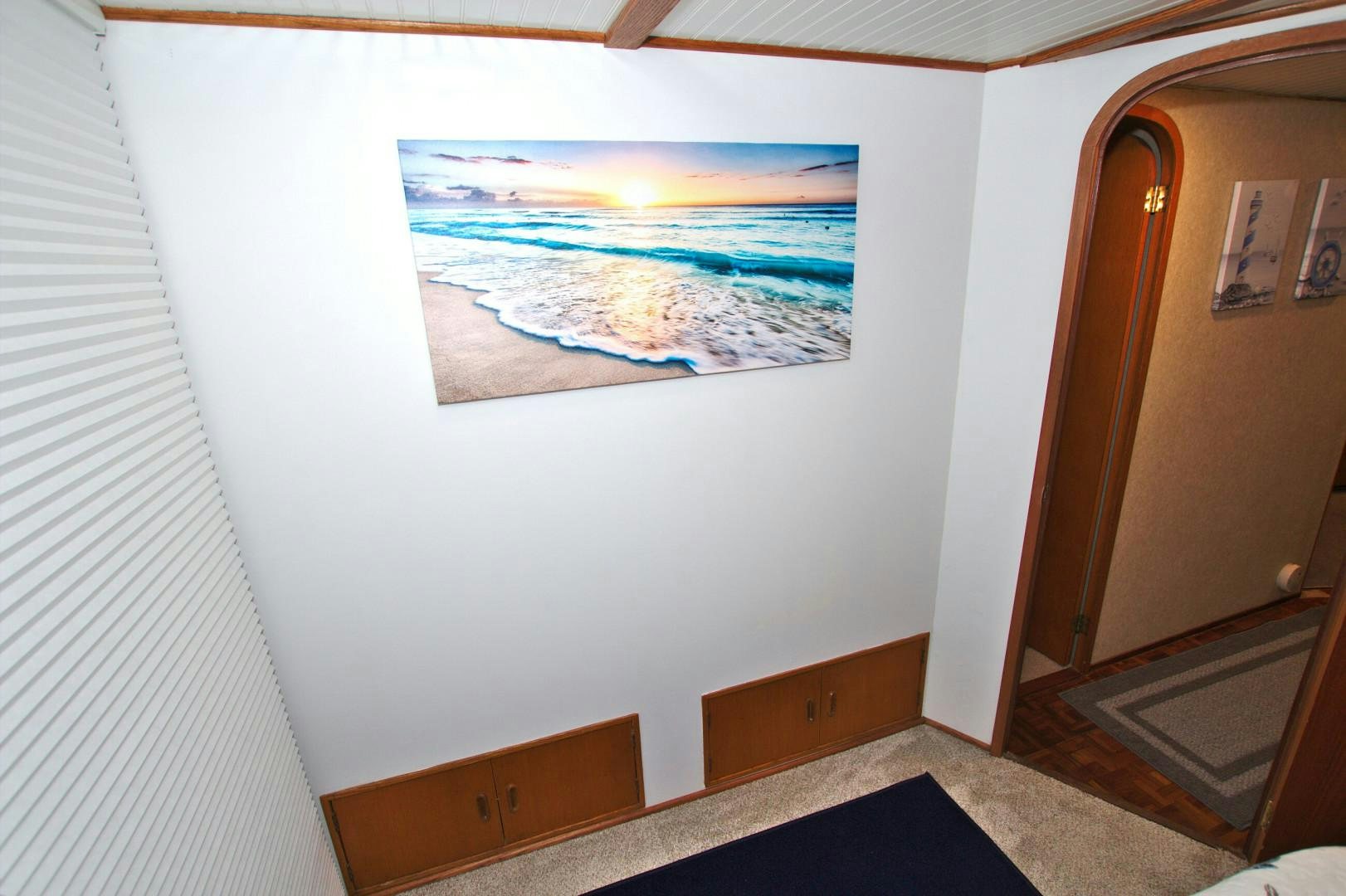 a painting on a wall aboard PENDANA Yacht for Sale