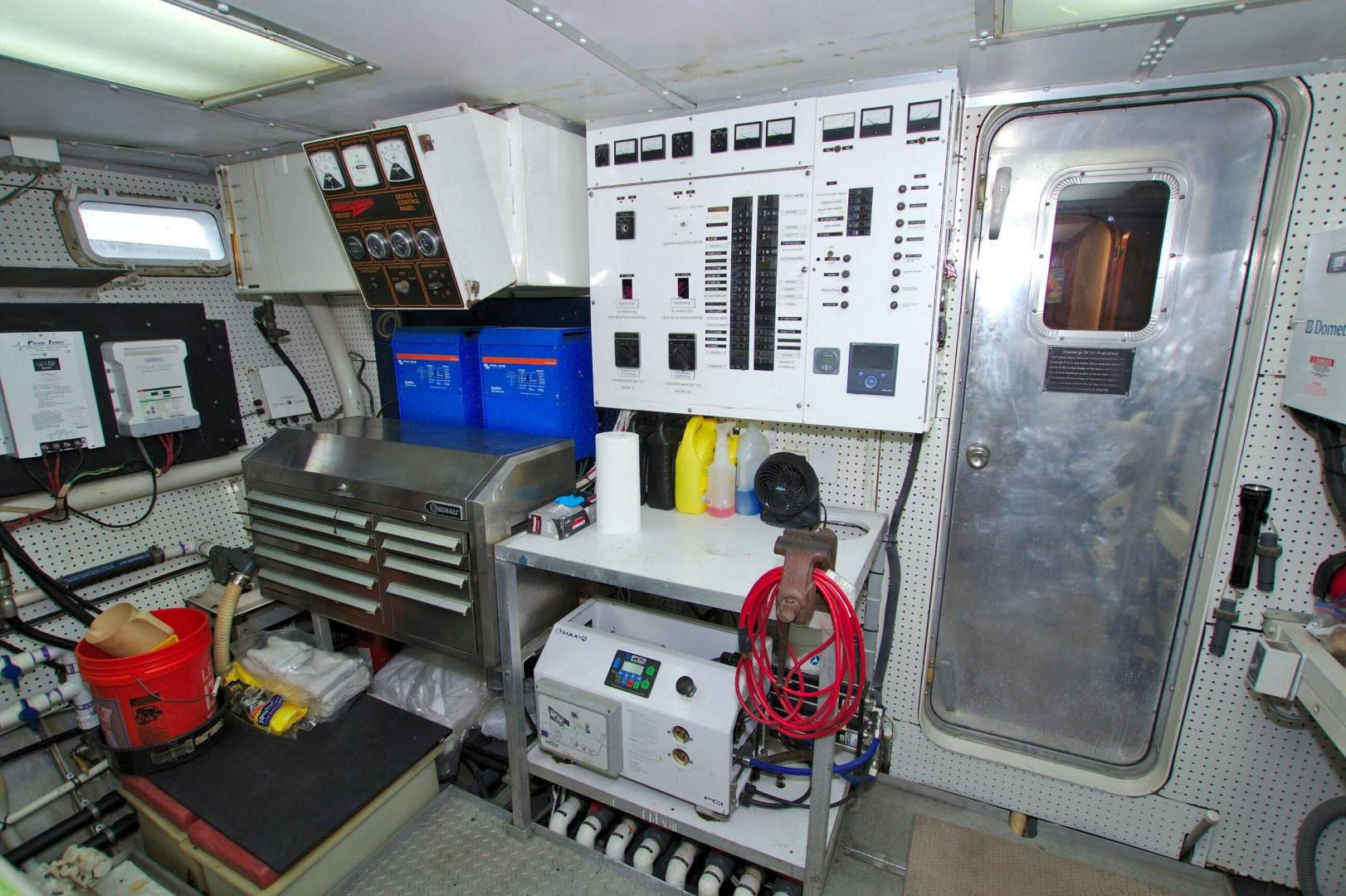 a person working in a room aboard PENDANA Yacht for Sale