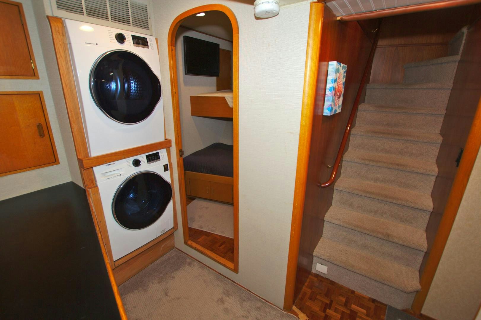 a small laundry room aboard PENDANA Yacht for Sale