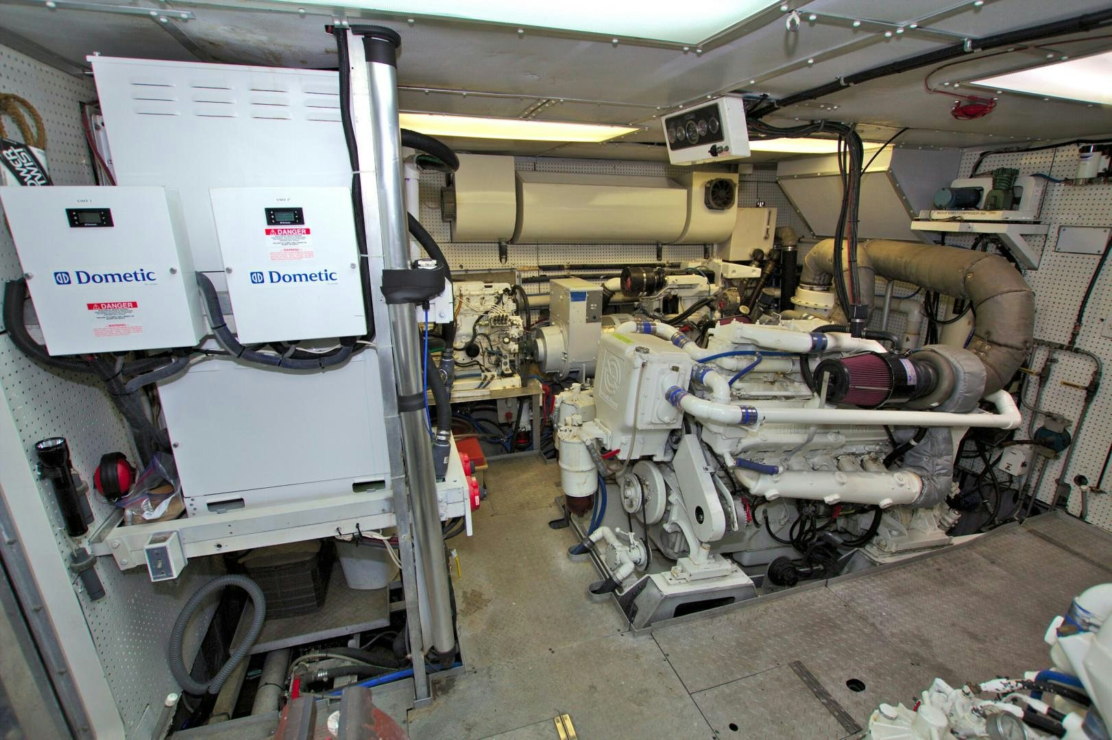 a room with machinery aboard PENDANA Yacht for Sale