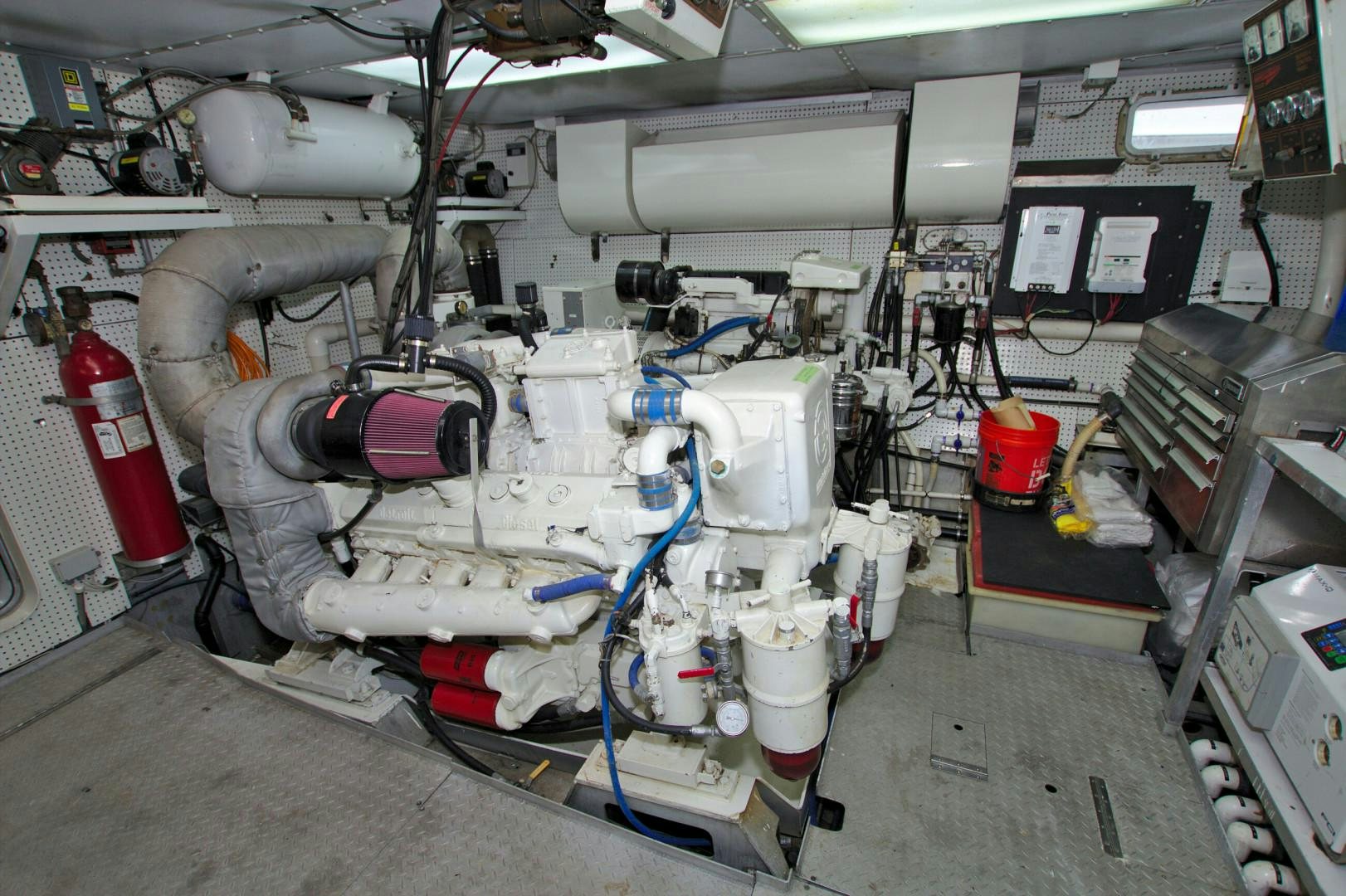 a room with machines and equipment aboard PENDANA Yacht for Sale