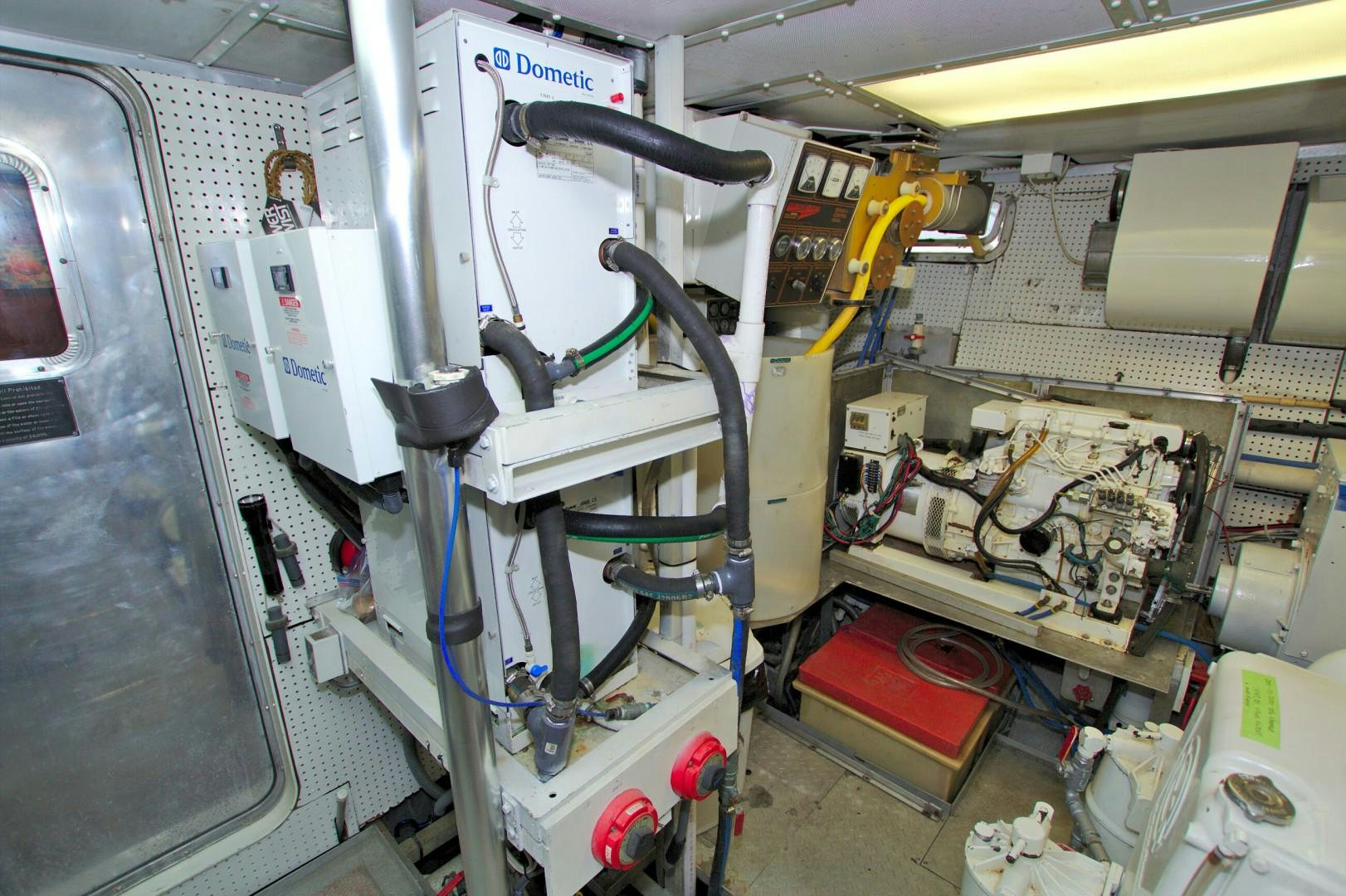 a machine inside a room aboard PENDANA Yacht for Sale