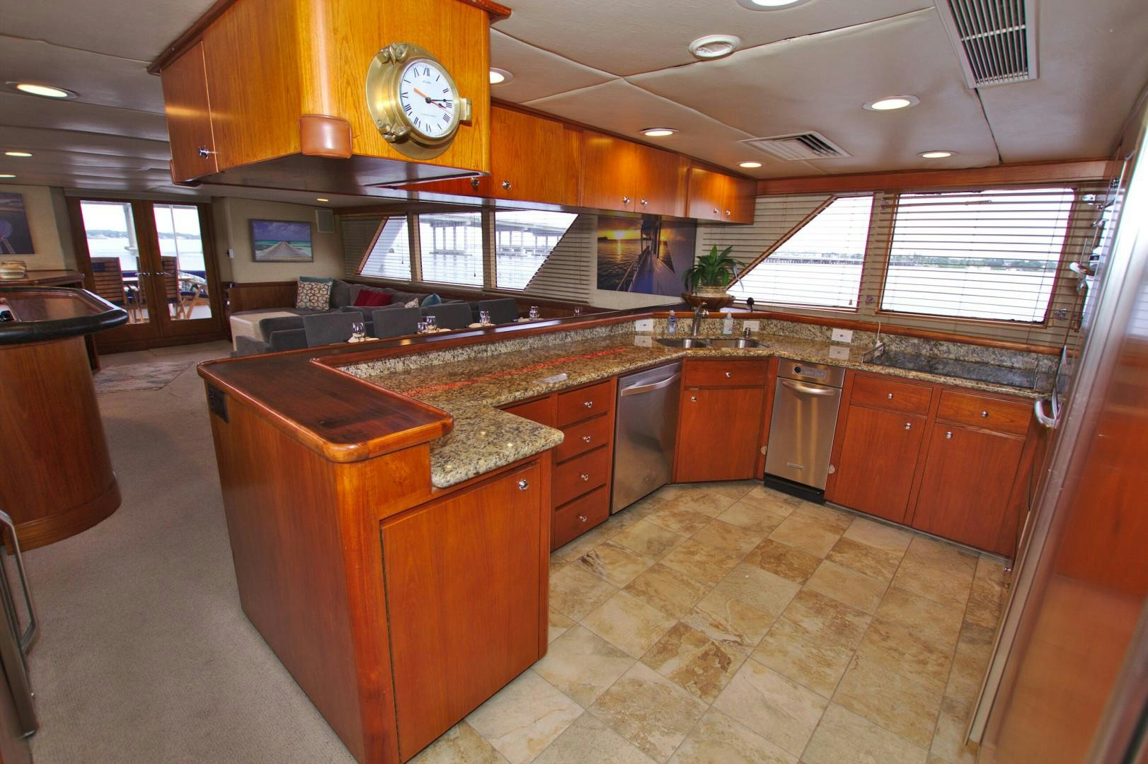 a kitchen with a large island aboard PENDANA Yacht for Sale