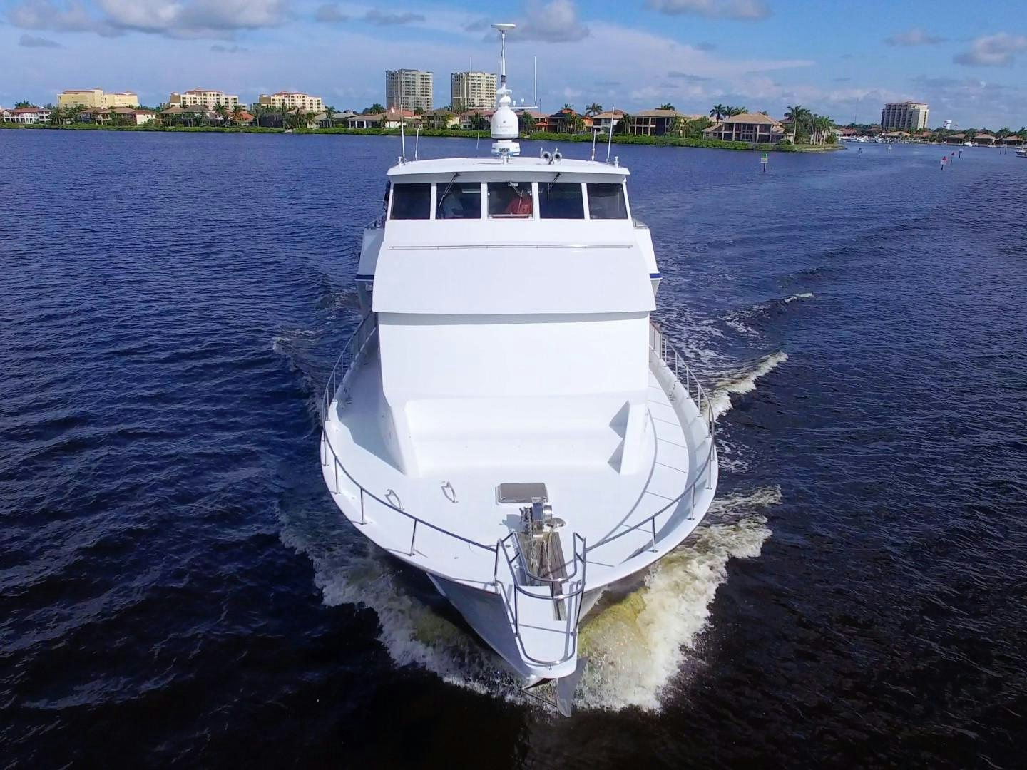 a white boat in the water aboard PENDANA Yacht for Sale