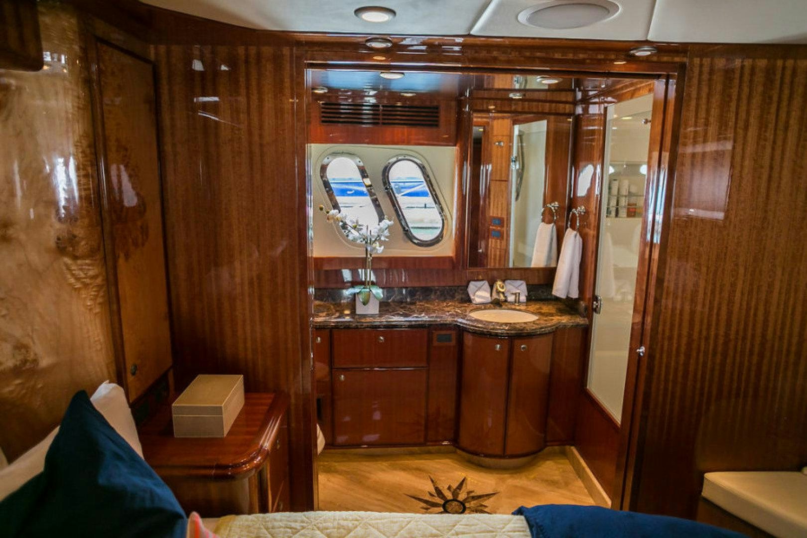 a bathroom with a sink and cabinets aboard CONDORS NEST Yacht for Sale