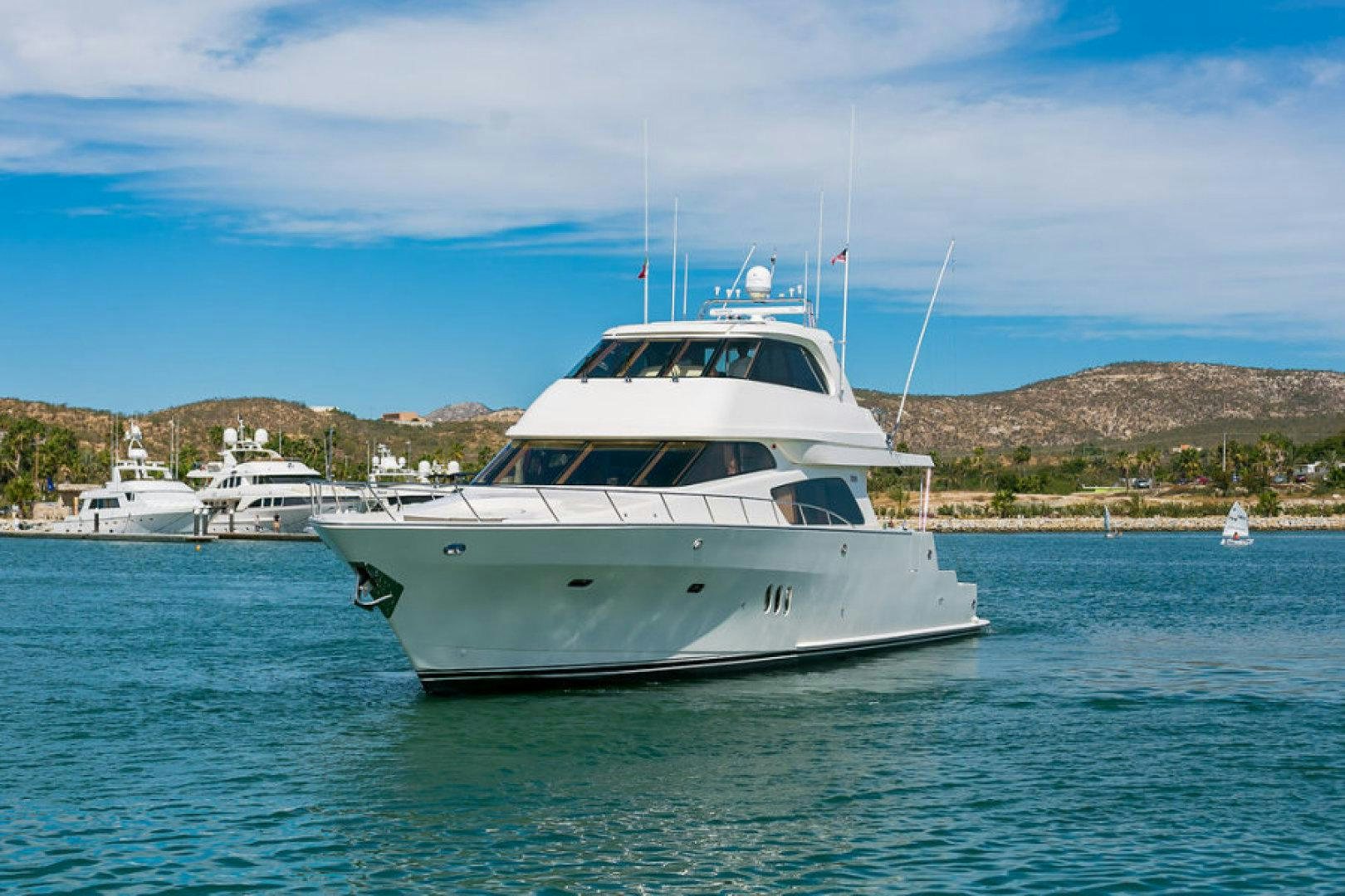 a white yacht in the water aboard CONDORS NEST Yacht for Sale