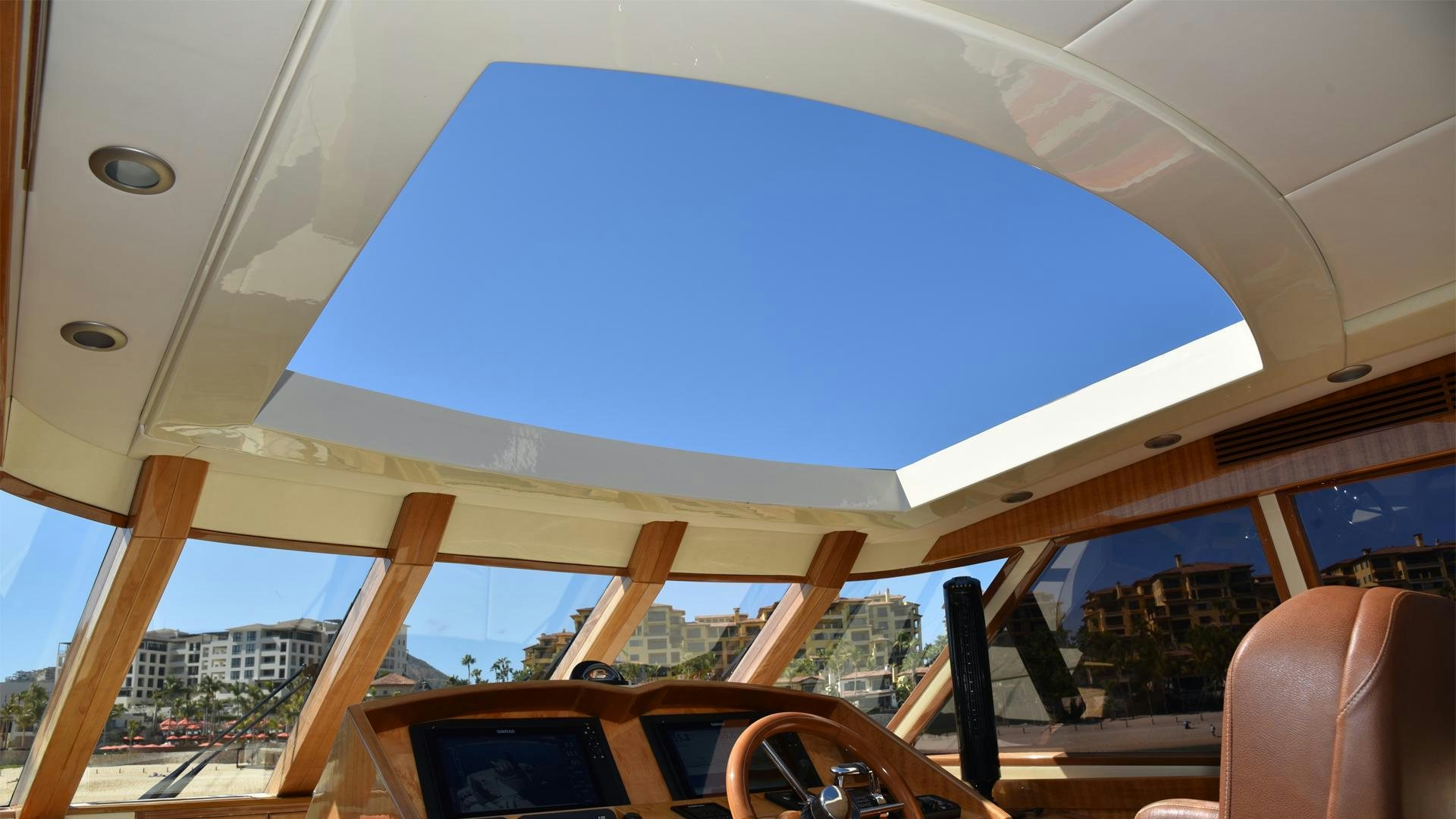 a large white building with a large window aboard CONDORS NEST Yacht for Sale