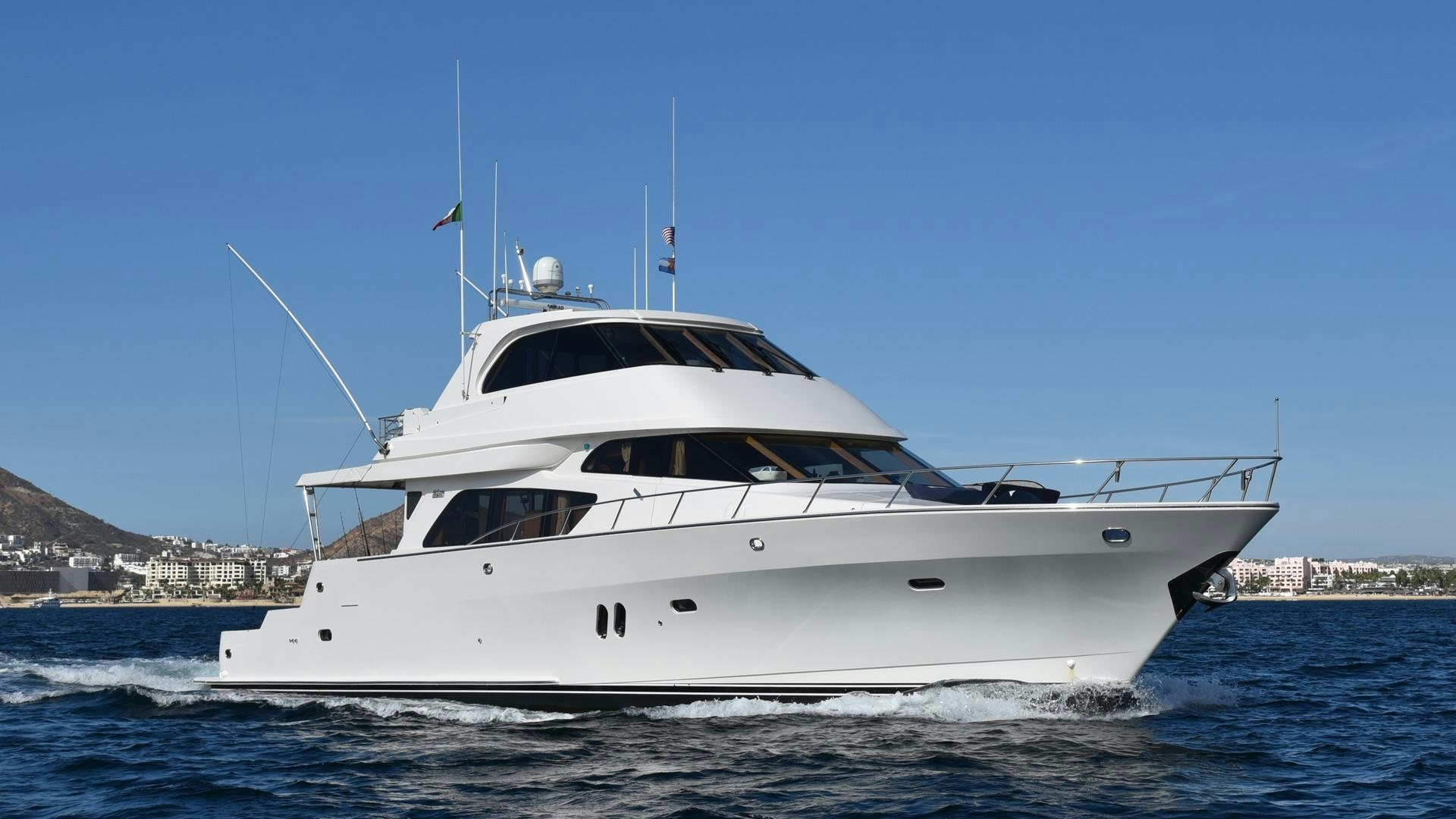 a white yacht on the water aboard CONDORS NEST Yacht for Sale