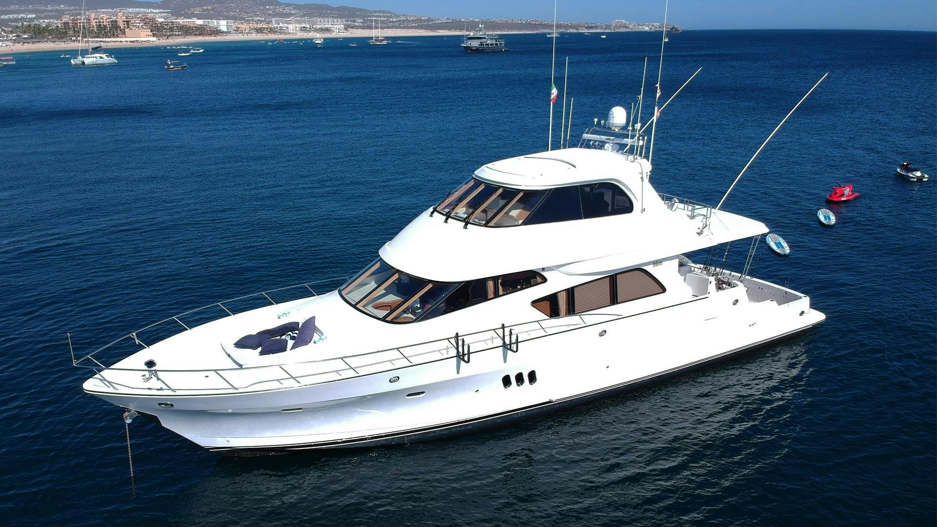 a white yacht in the water aboard CONDORS NEST Yacht for Sale