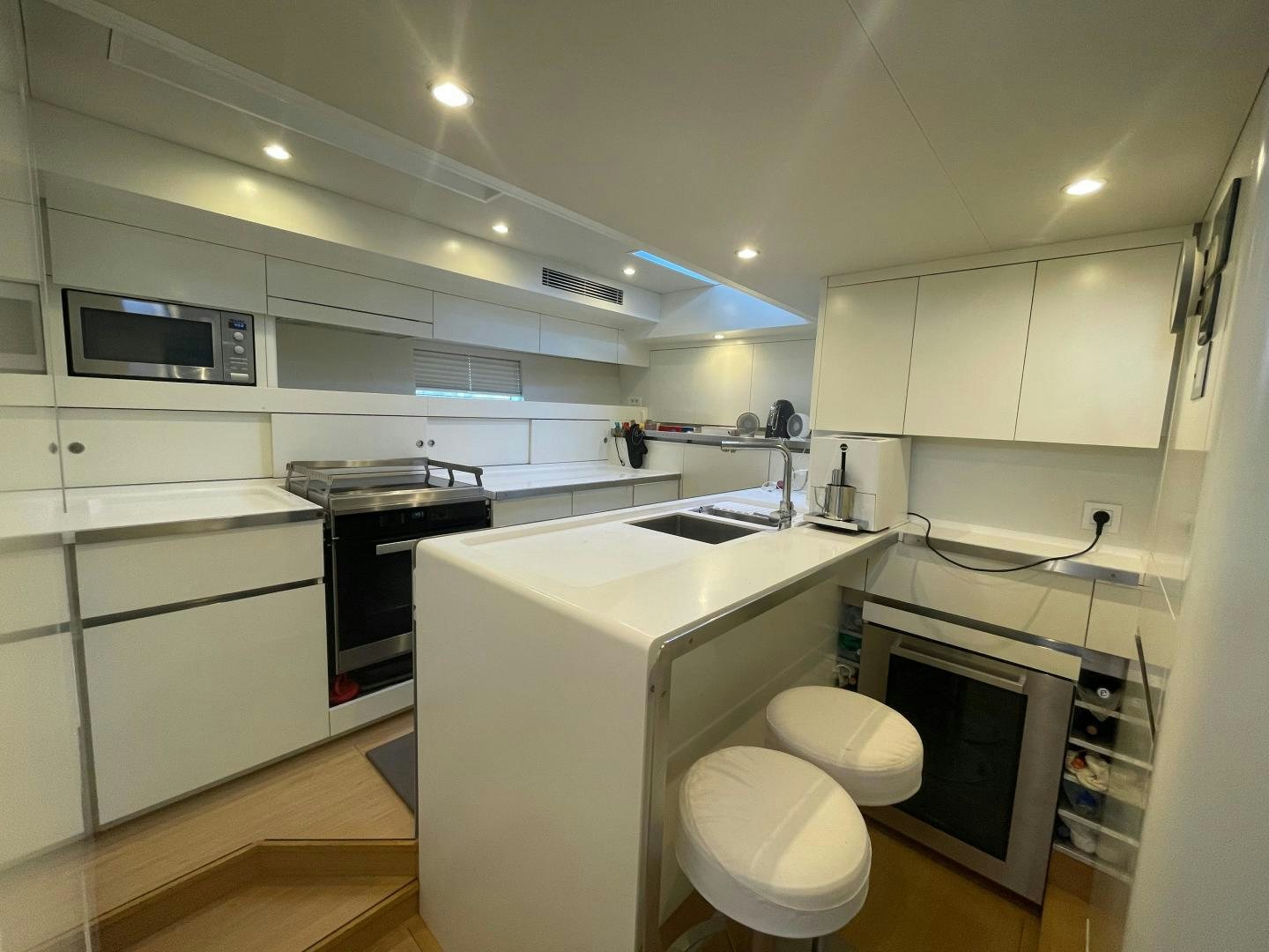 a small kitchen with a toilet aboard KESTREL Yacht for Sale