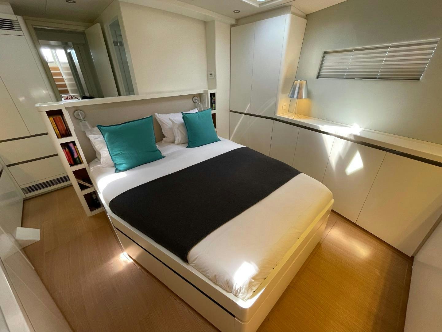 a bed in a room aboard KESTREL Yacht for Sale