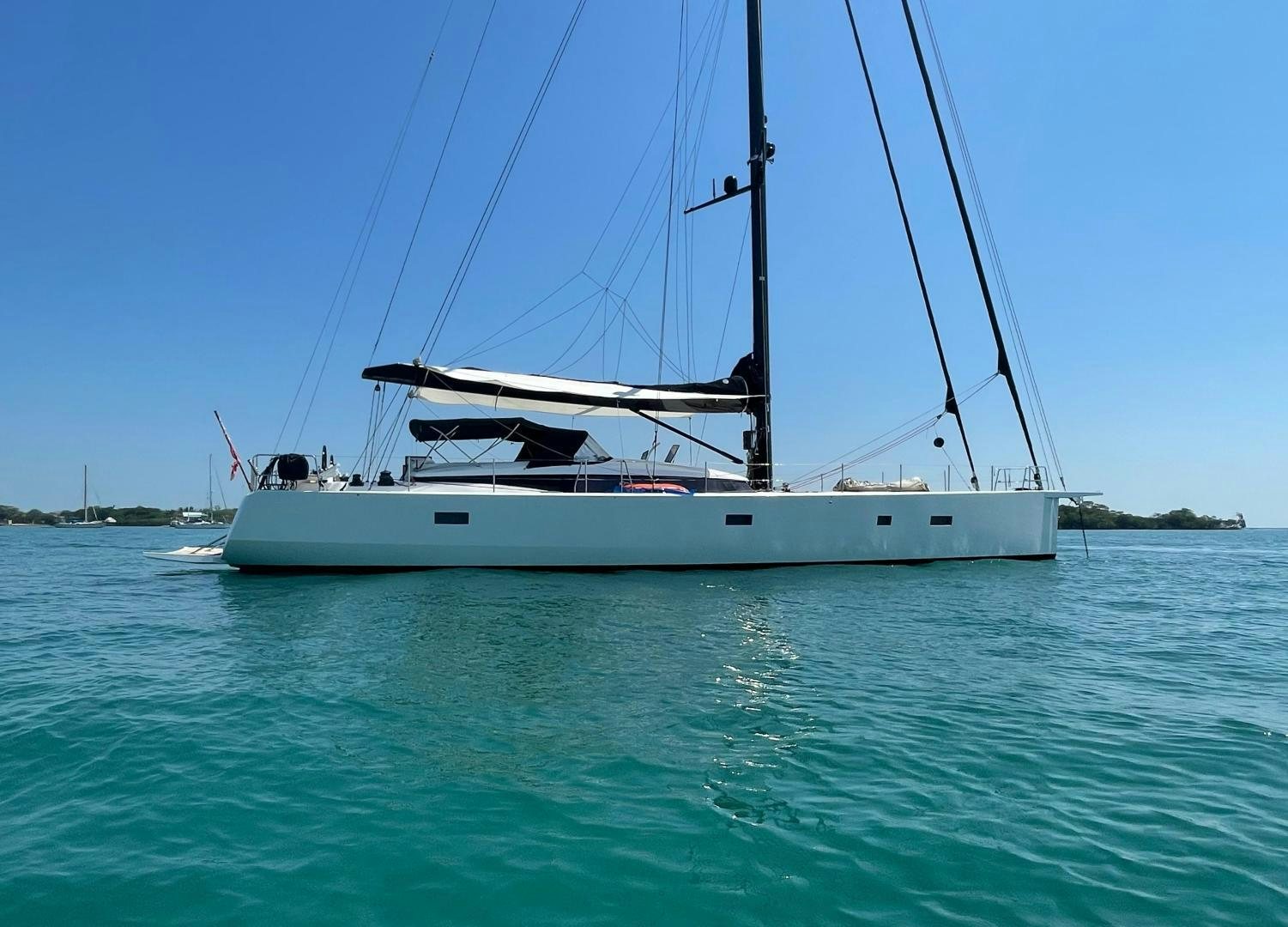 a white boat in the water aboard KESTREL Yacht for Sale