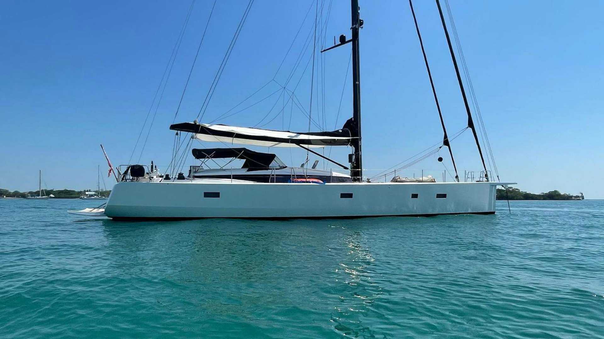a white boat in the water aboard KESTREL Yacht for Sale