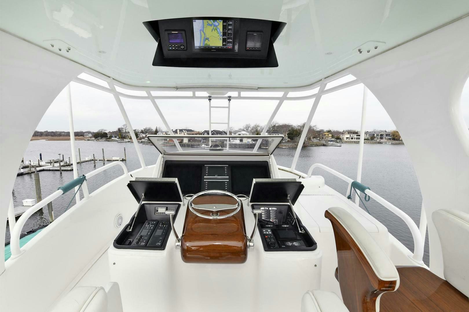 a boat with a table and chairs aboard ON THE EDGE Yacht for Sale
