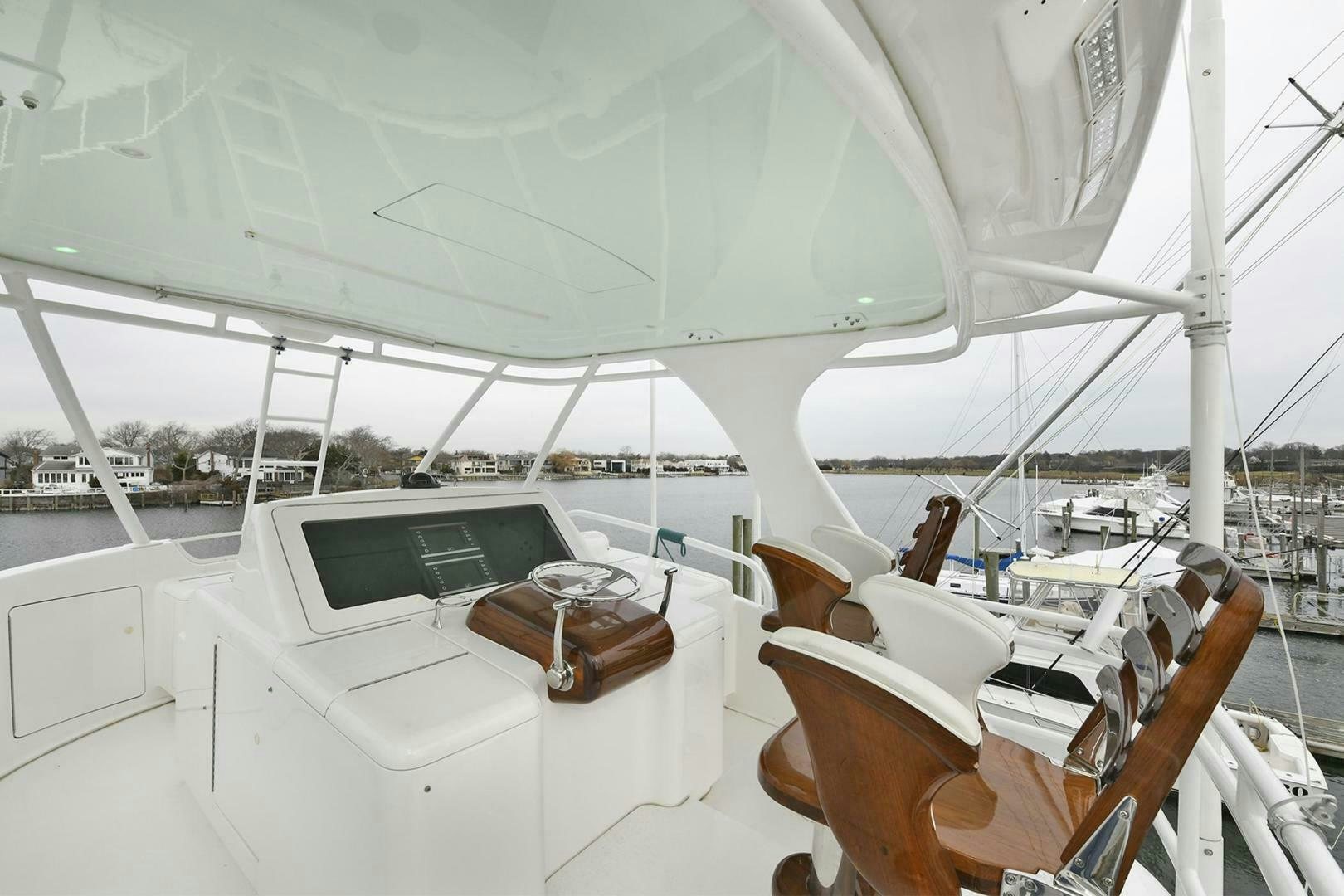 a boat with a white roof and a white car on it aboard ON THE EDGE Yacht for Sale