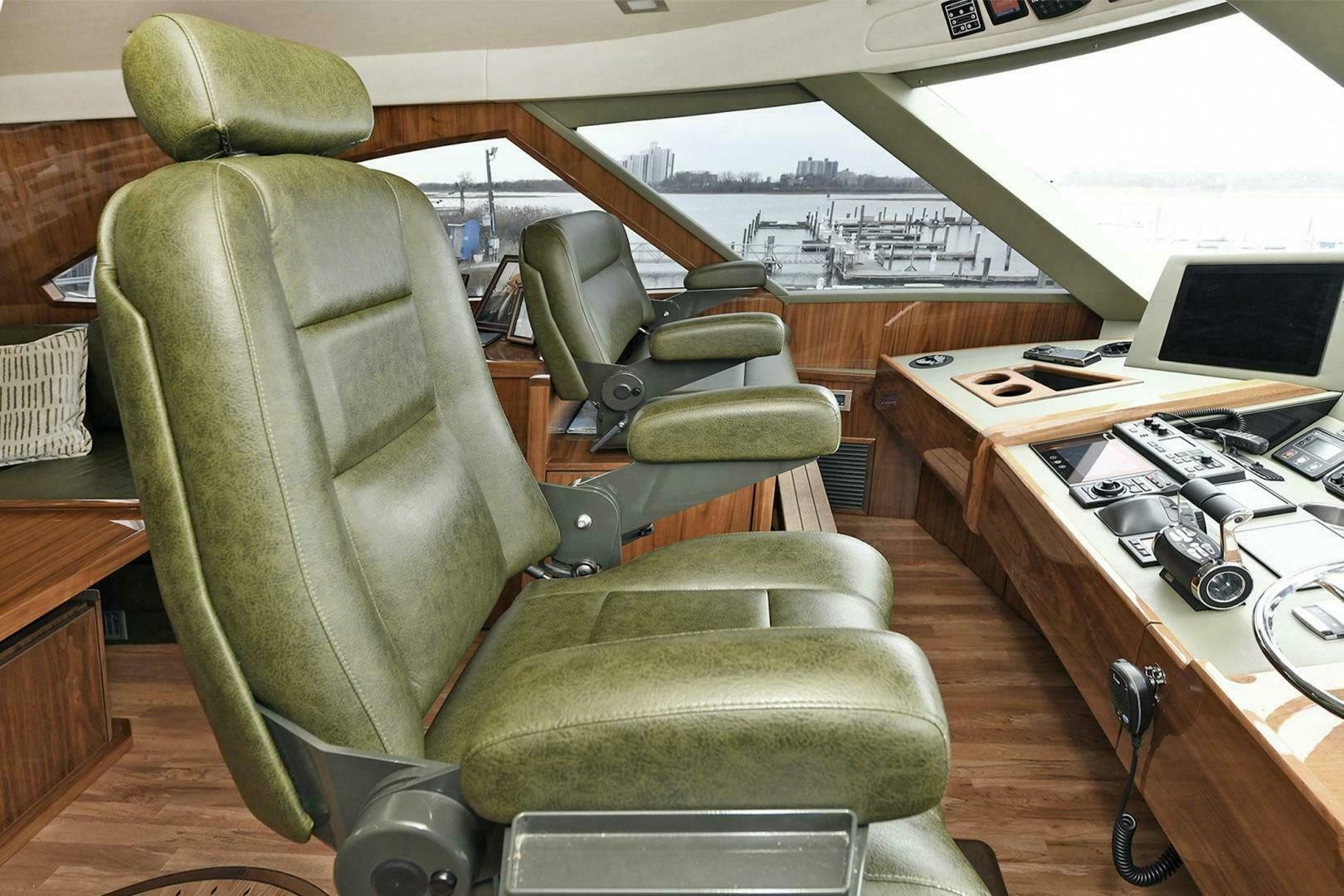 a green office chair aboard ON THE EDGE Yacht for Sale