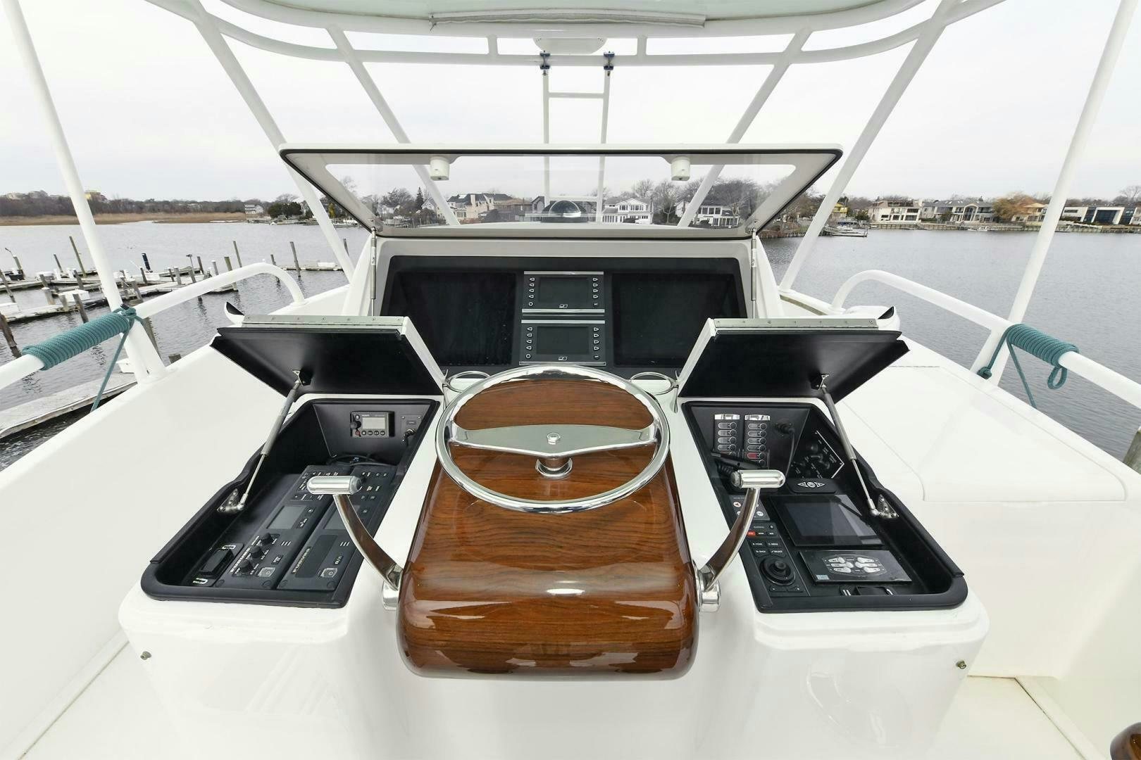 a table with chairs on it aboard ON THE EDGE Yacht for Sale