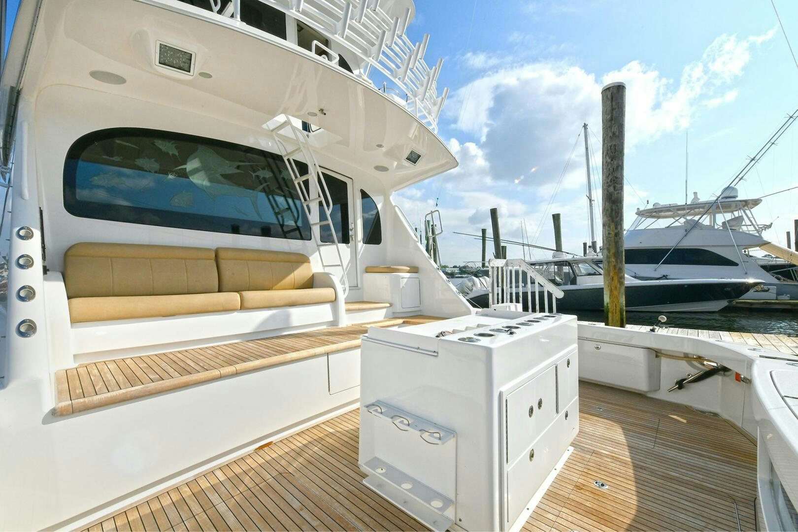 a white boat on a deck aboard ON THE EDGE Yacht for Sale