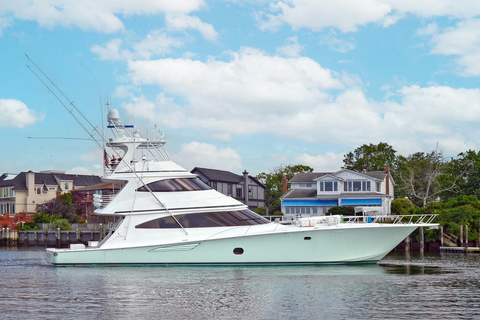 a white boat on the water aboard ON THE EDGE Yacht for Sale