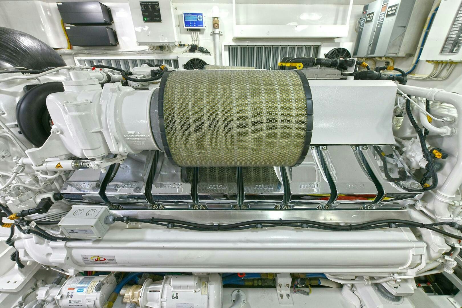 a machine with a green seat aboard ON THE EDGE Yacht for Sale