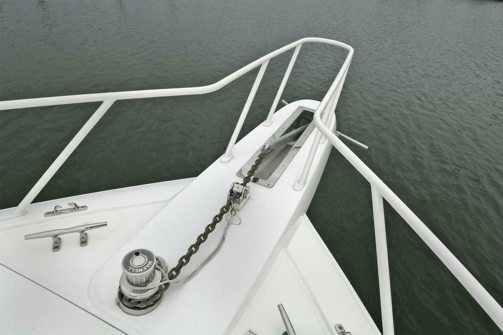 a white boat with ropes aboard ON THE EDGE Yacht for Sale