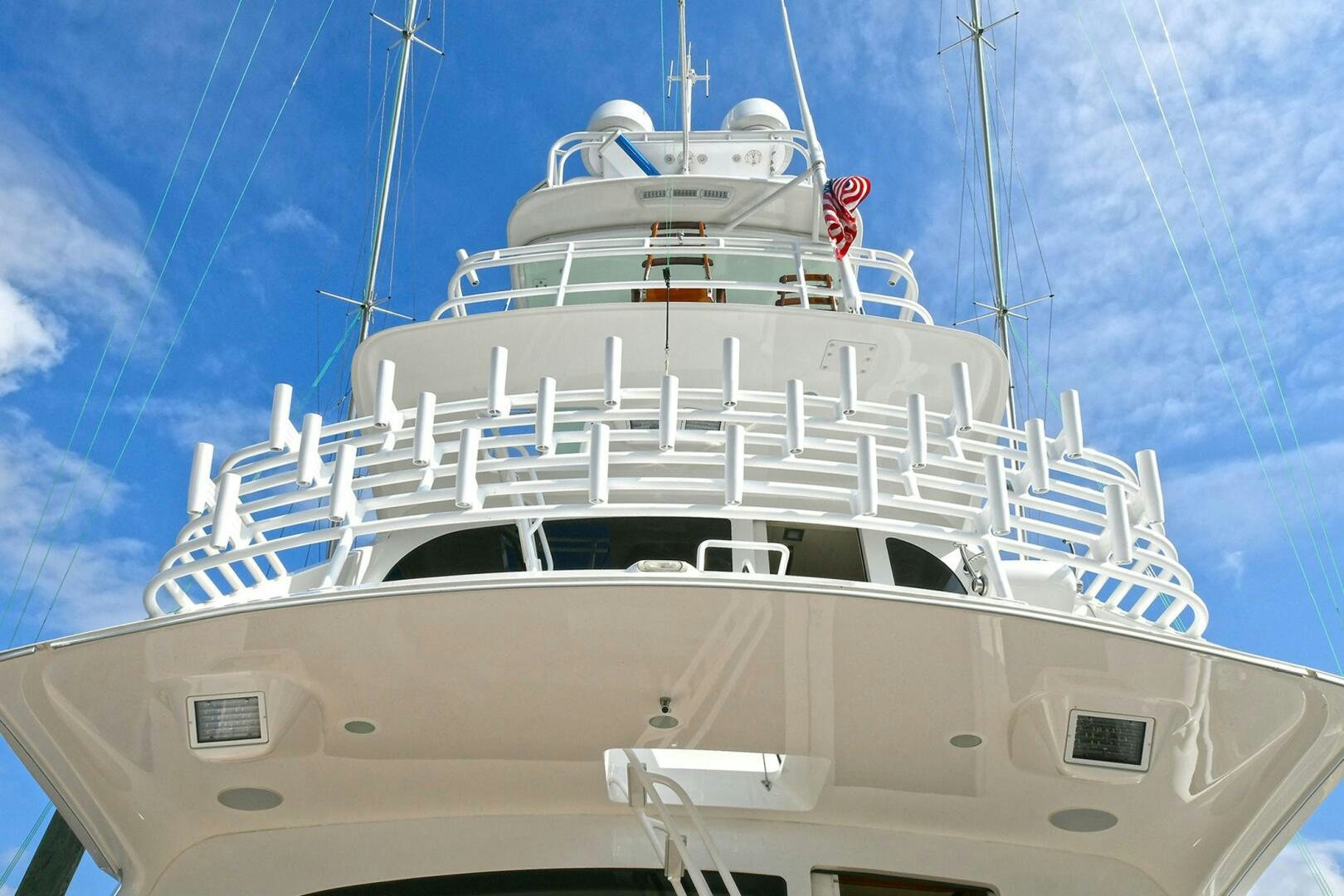 a white yacht on a sunny day aboard ON THE EDGE Yacht for Sale