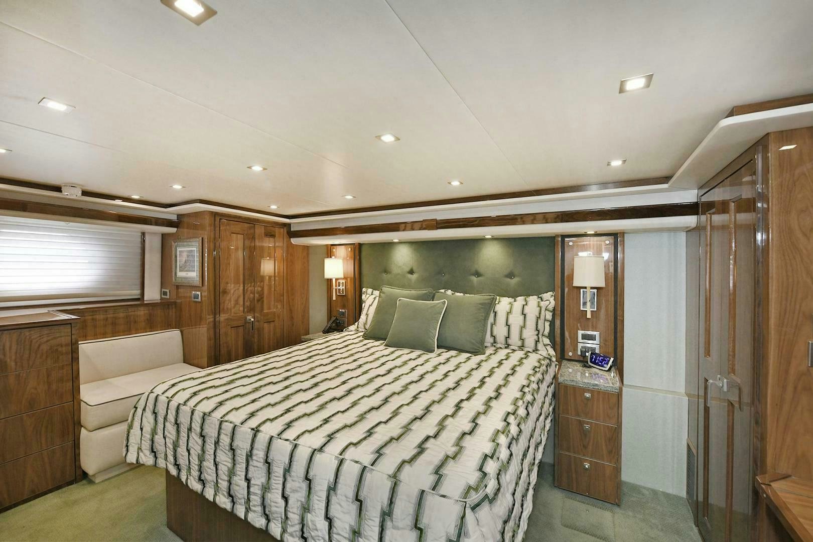 a room with a bed and a closet aboard ON THE EDGE Yacht for Sale