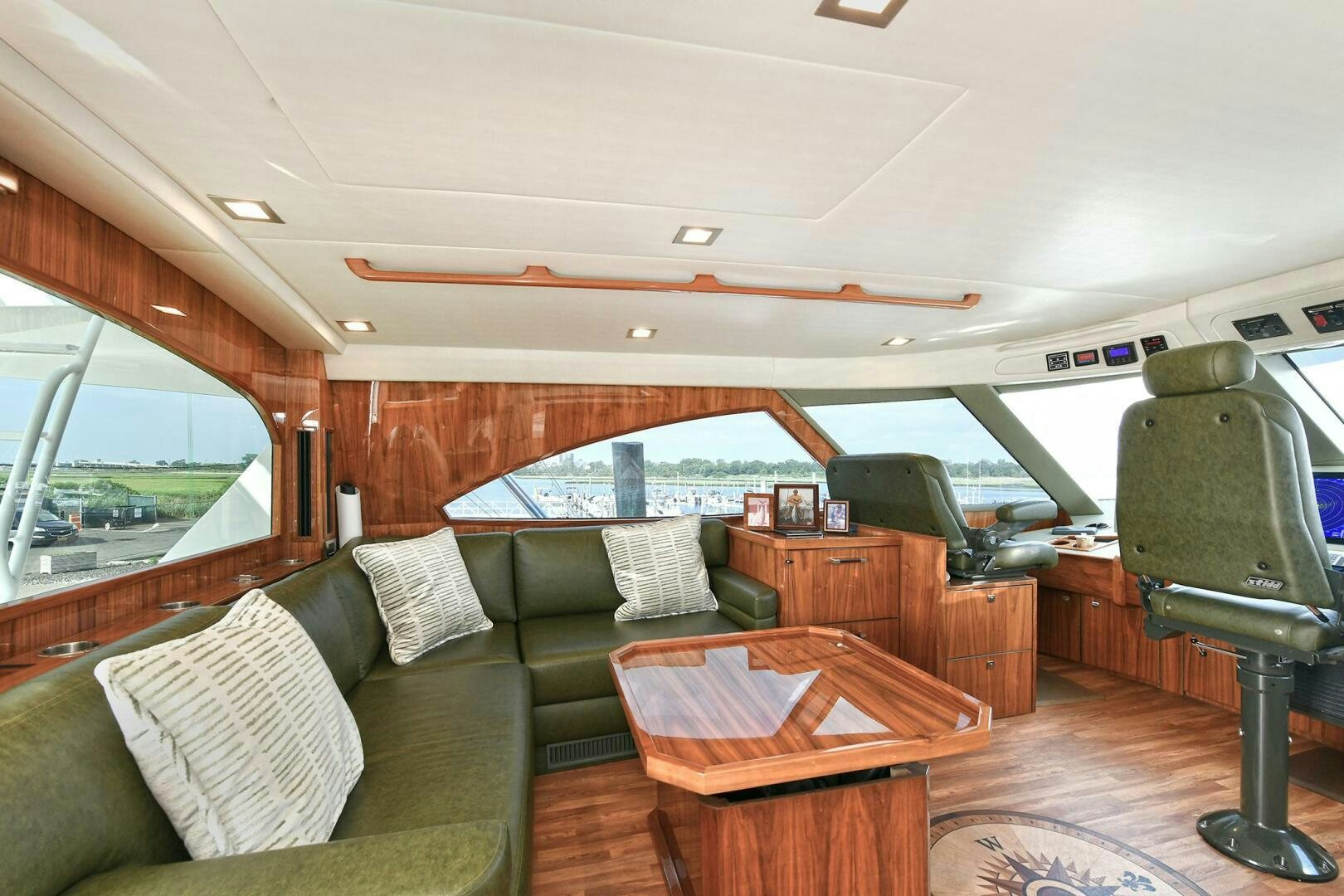 a living room with a couch and a table aboard ON THE EDGE Yacht for Sale