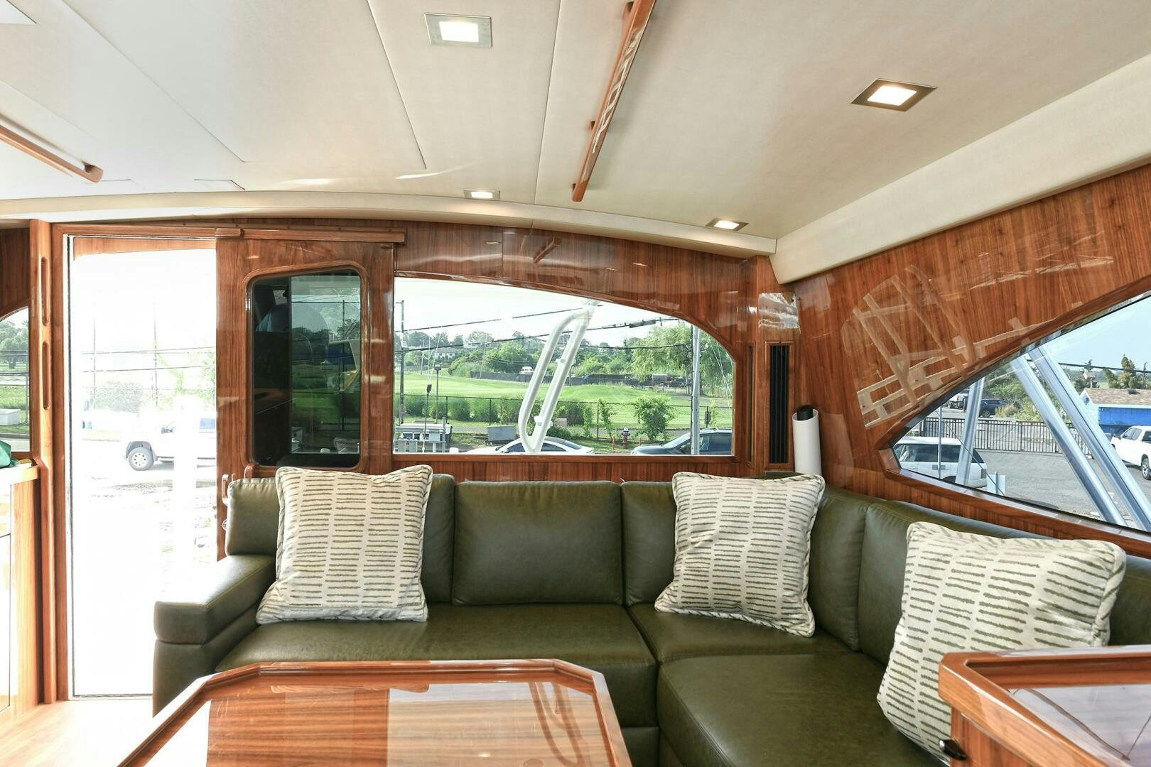 a couch in a living room aboard ON THE EDGE Yacht for Sale