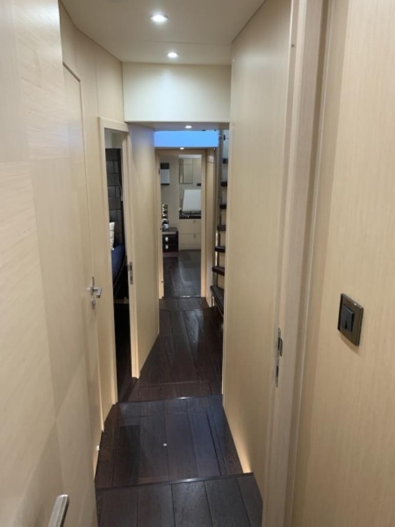 a hallway with doors aboard NBLUE Yacht for Sale