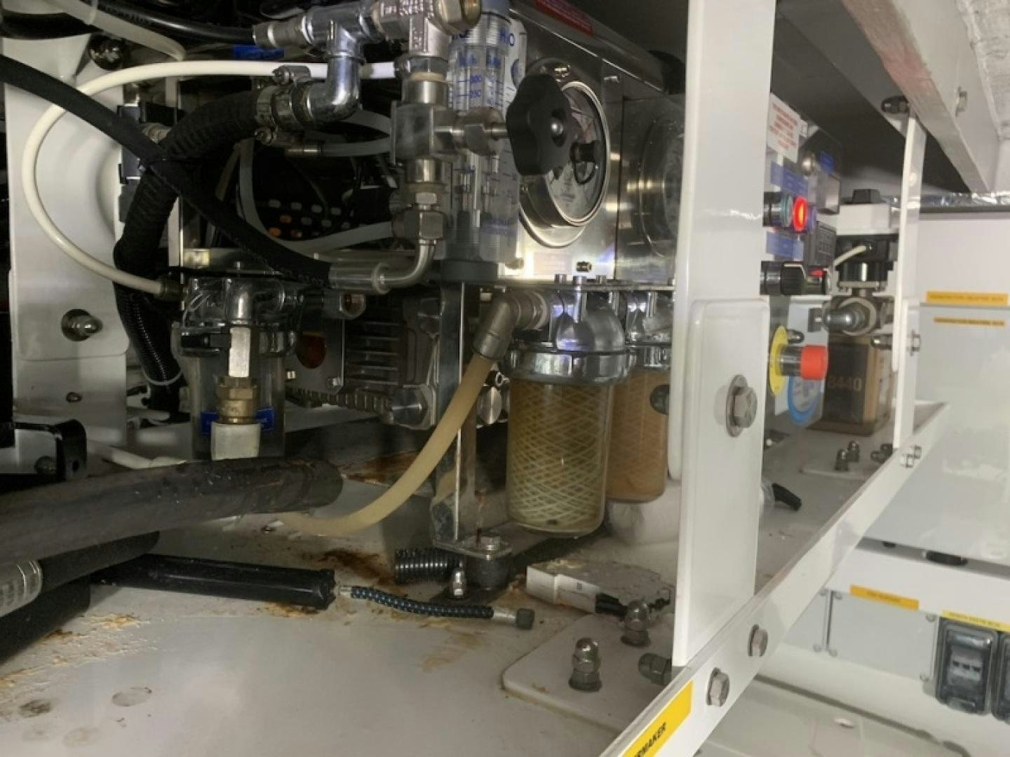 a machine with a large metal cylinder aboard NBLUE Yacht for Sale